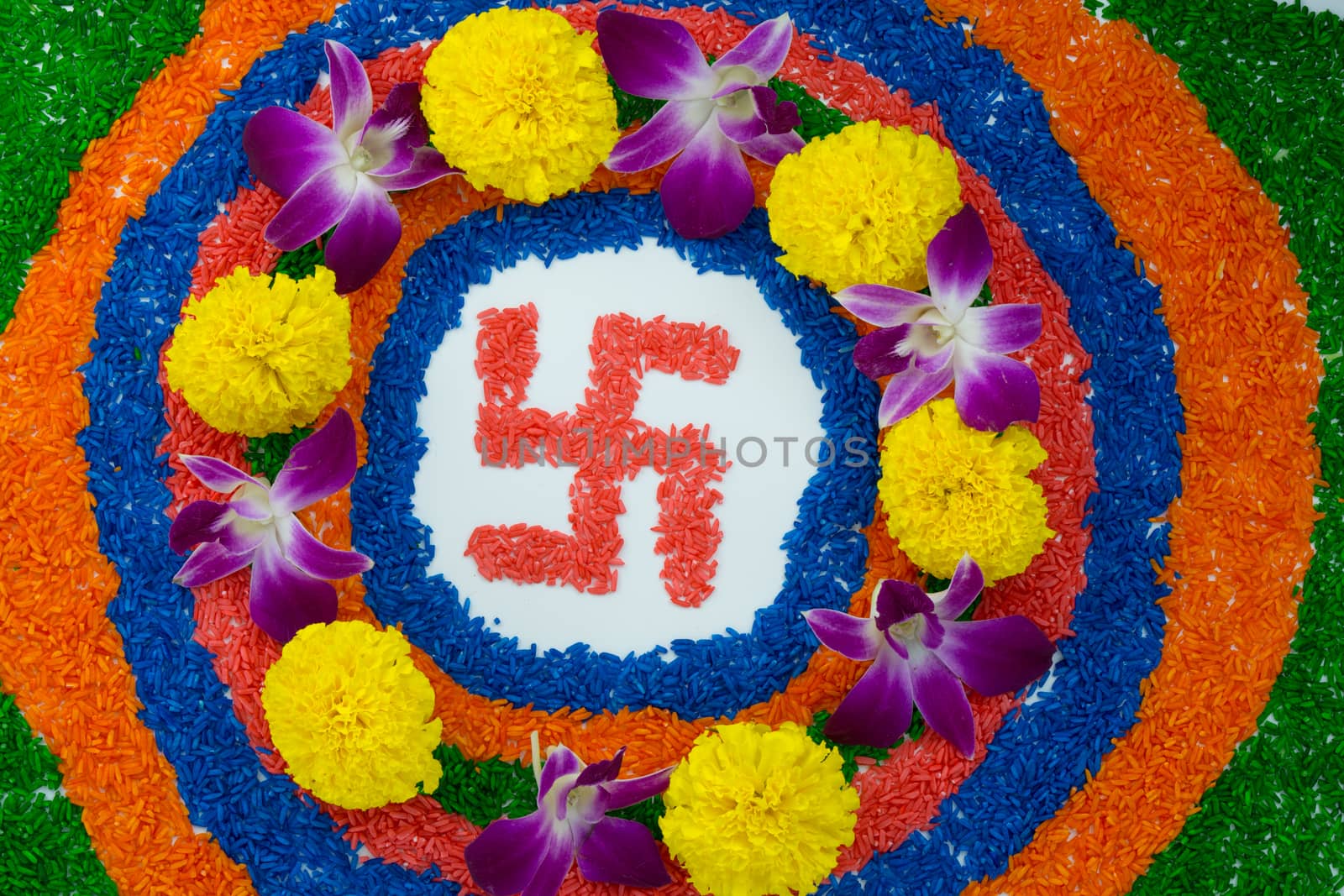 Indian festival Diwali, Diya oil lamps lit on colorful rangoli with Swastika symbol. Hindu traditional. Happy Deepavali.