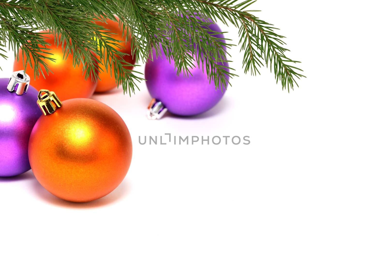 Christmas decoration. Fir twig with Christmas balls on white background