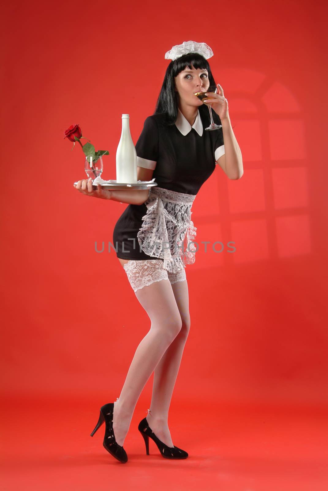 Young woman in a hosemaid uniform
