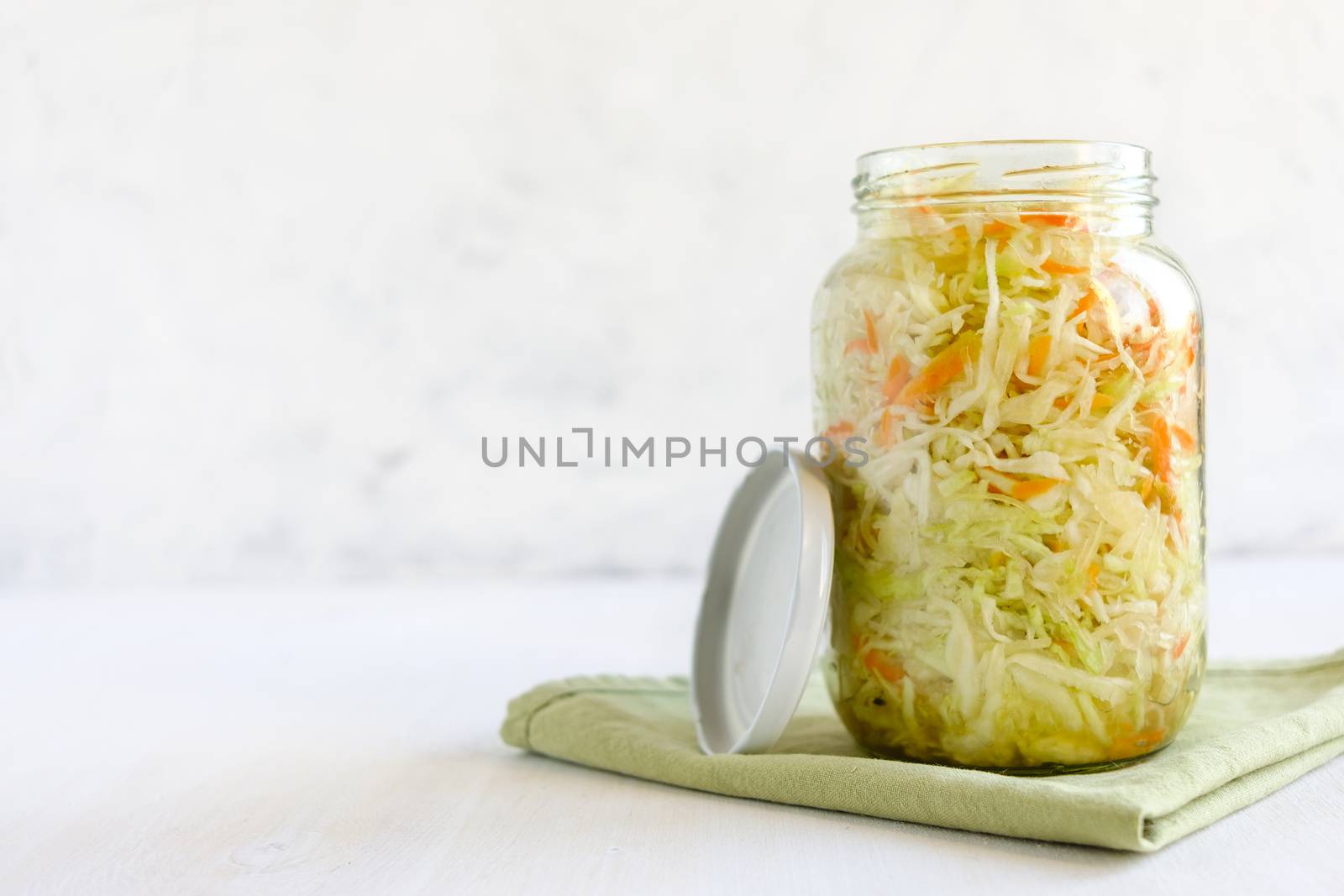 Sealed jar with tasty sauerkraut by sergii_gnatiuk