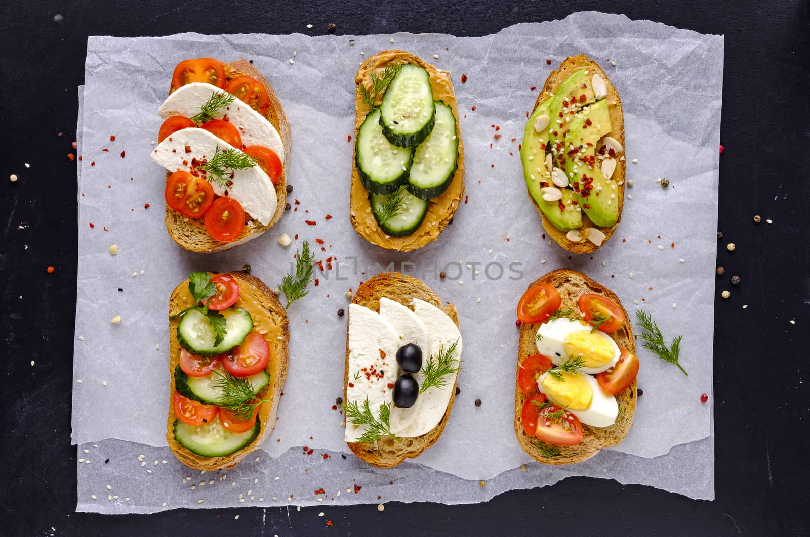 Set of sandwiches served on rise paper by sergii_gnatiuk