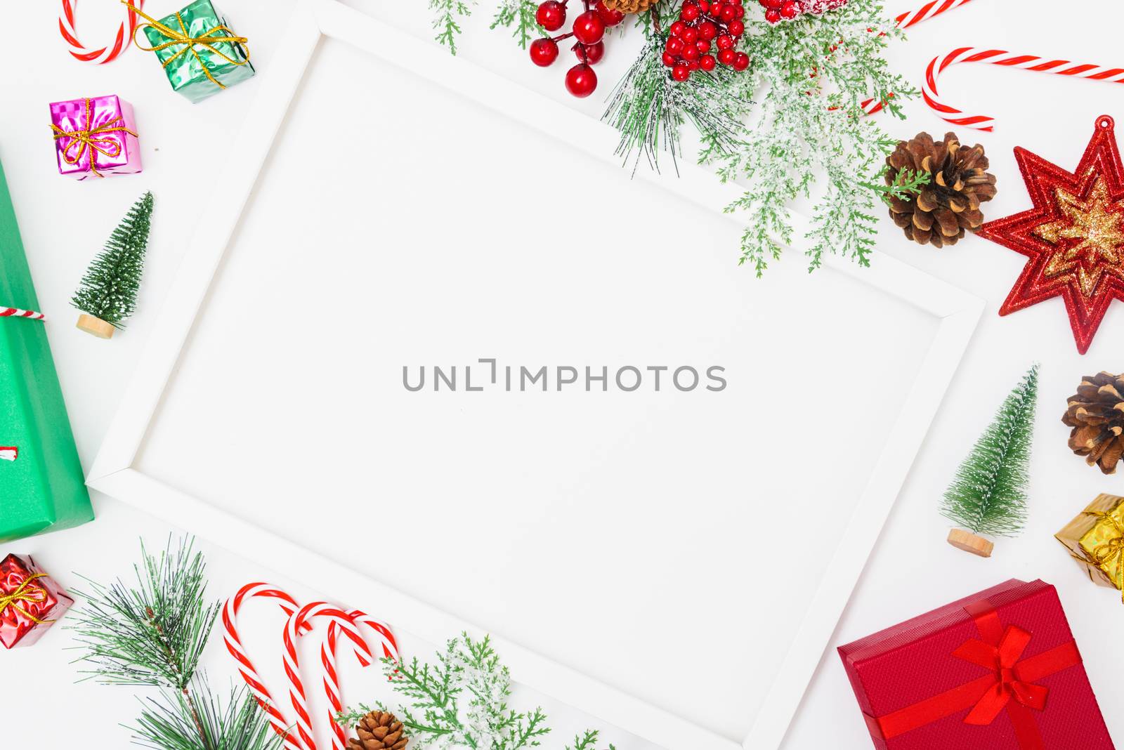 Christmas composition decorations, fir tree branches with Photo square frame on white background. Merry Christmas concept. Copy space for text