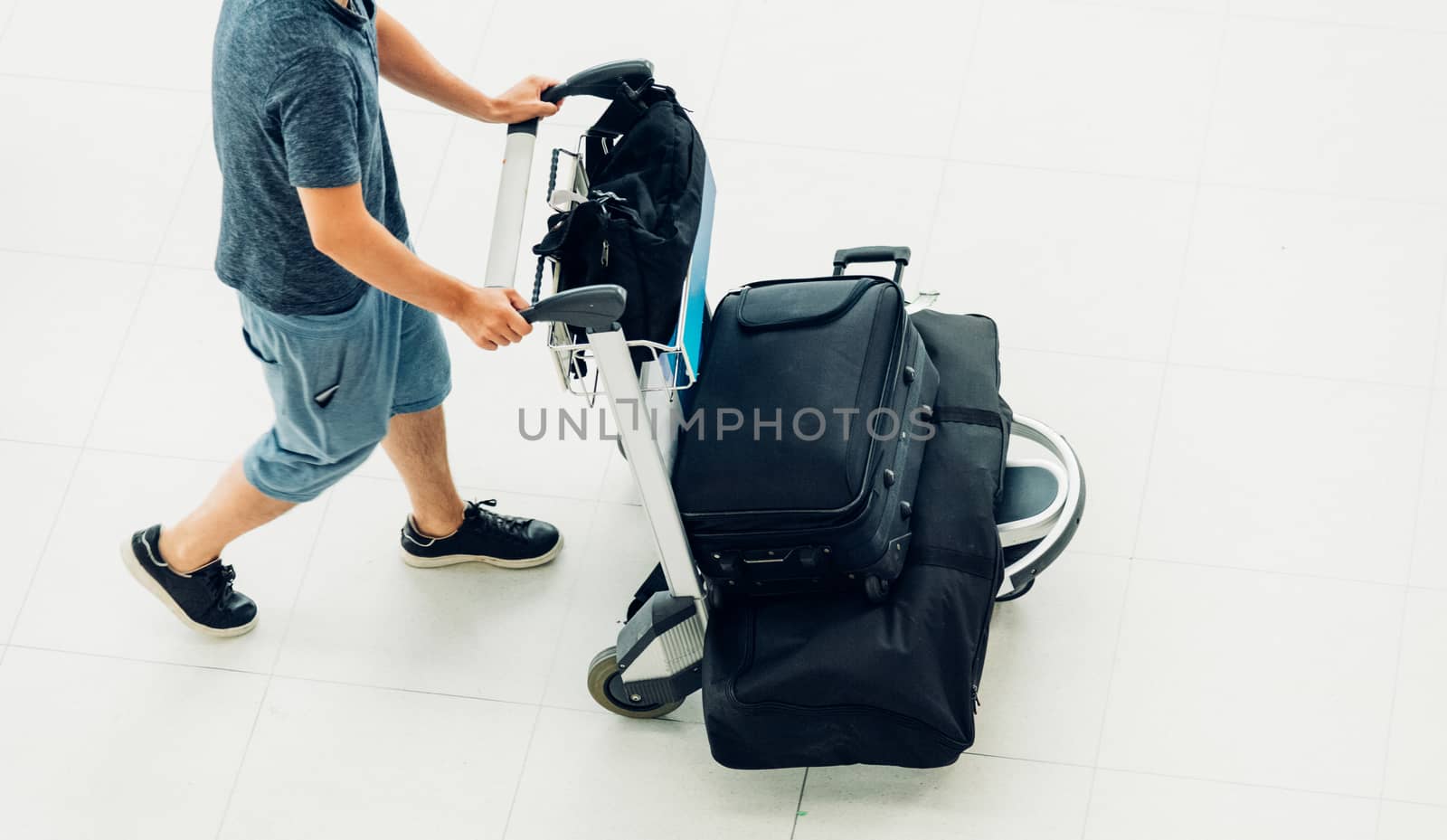 People traveling luggage bag he walking by Sorapop