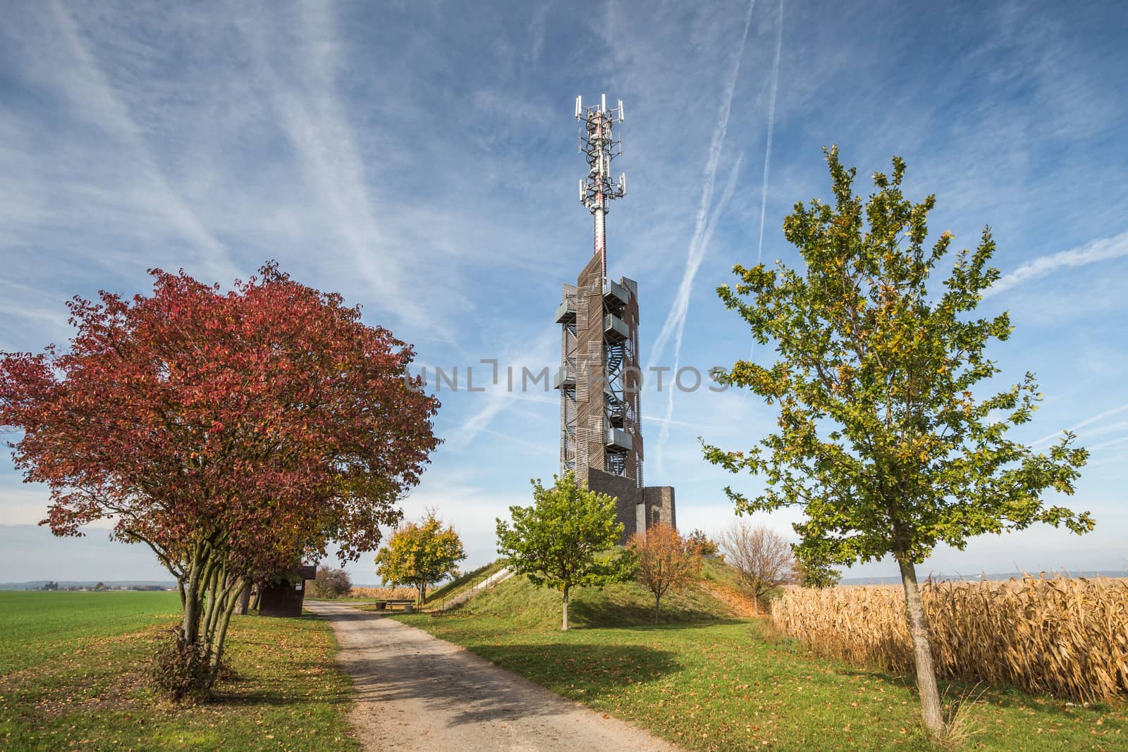 Romanka Lookout Tower is located near village Hruby Jesenik in the district Nymburk in the Central Region. Czech republic. Is is also antenna transmitter. Nice autumn colorful scene with blue sky. by petrsvoboda91