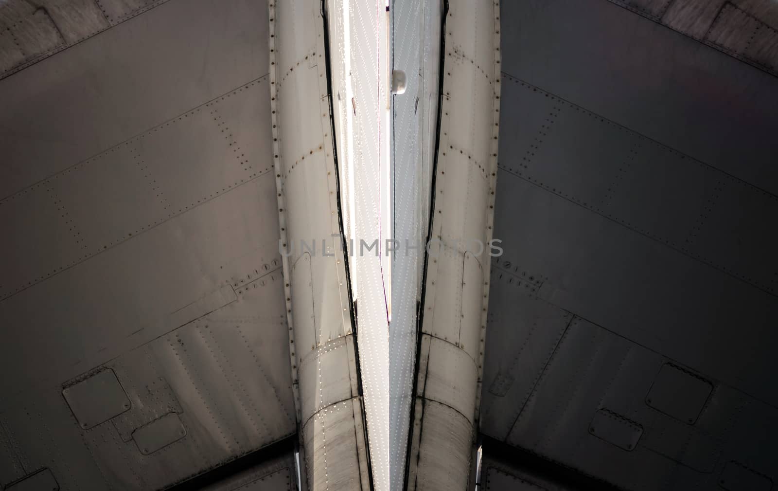 technical aviation background fragment of an airplane wings close up
