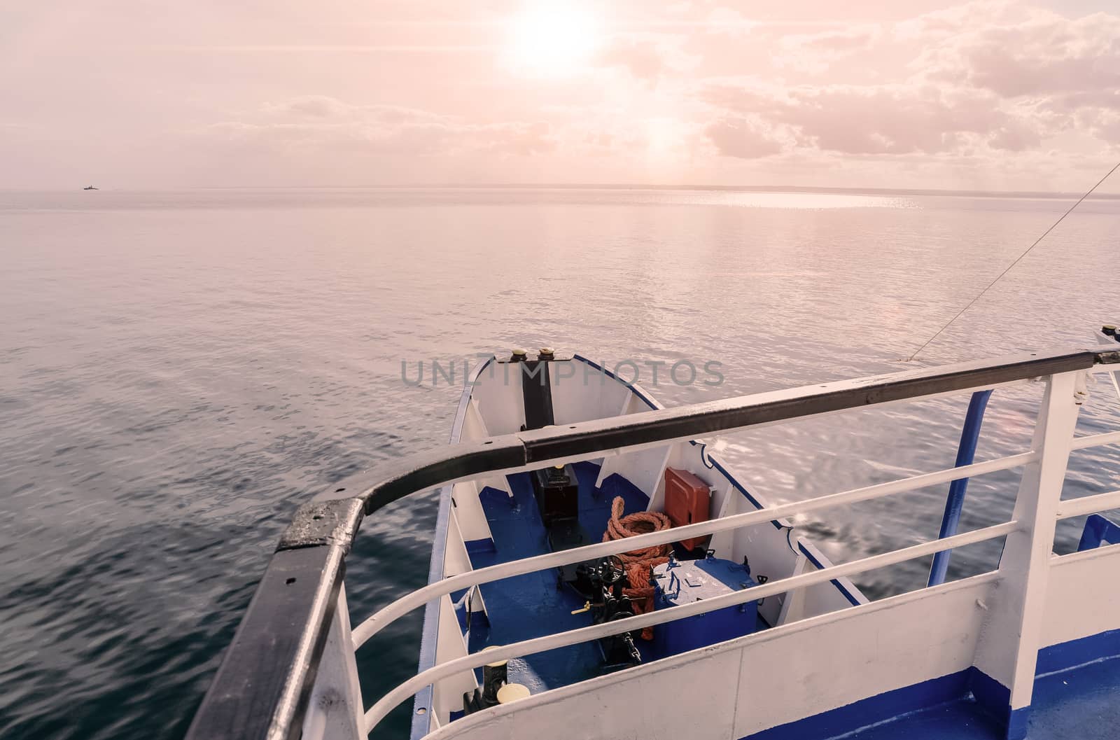 The nose of the ship, the bow of the floating ship, the cruise liner, the yacht, the boat on the background of the blue salt sea, the ocean on the tropical sea warm resort,