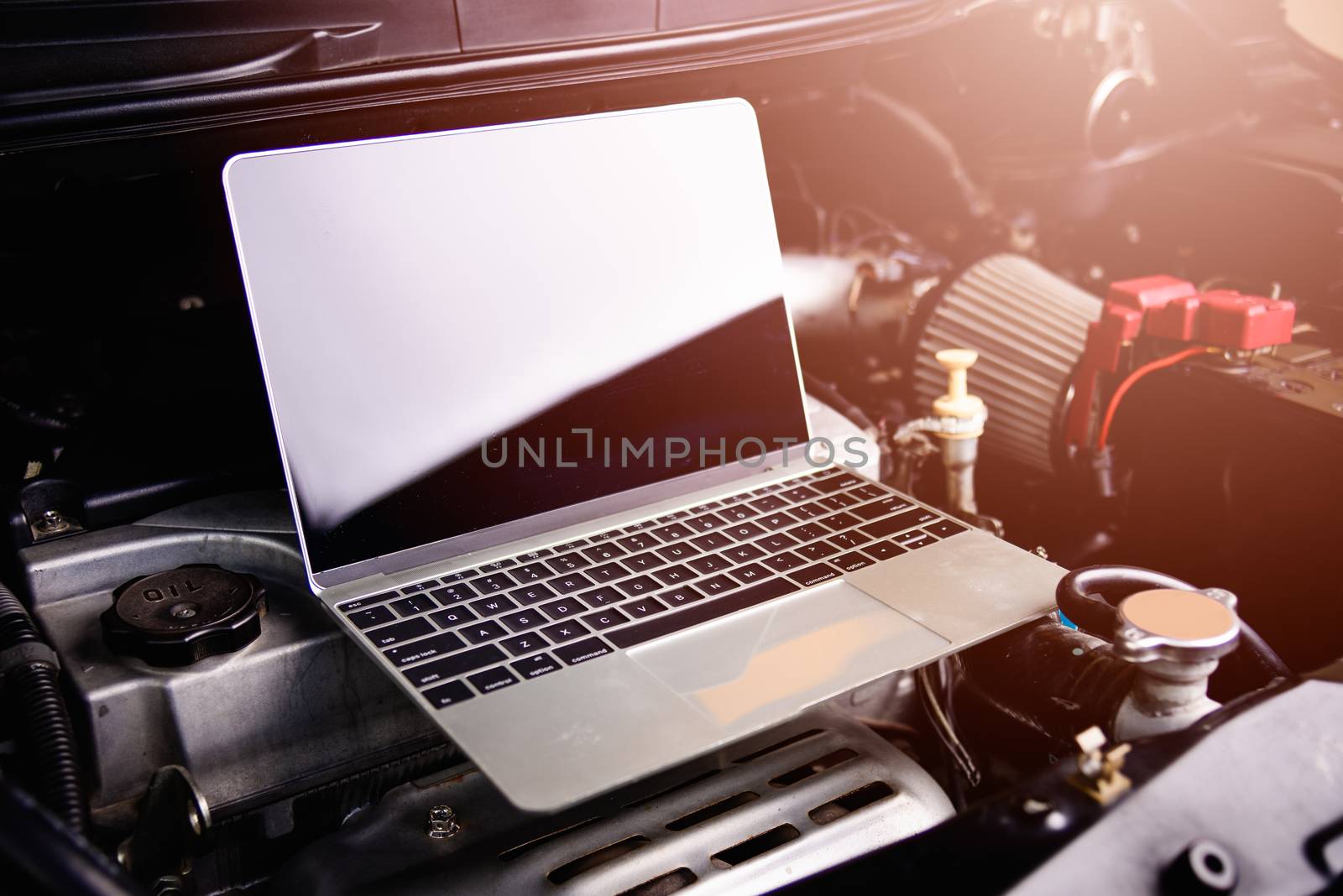 Professional car repair or maintenance mechanic engine working s by Sorapop