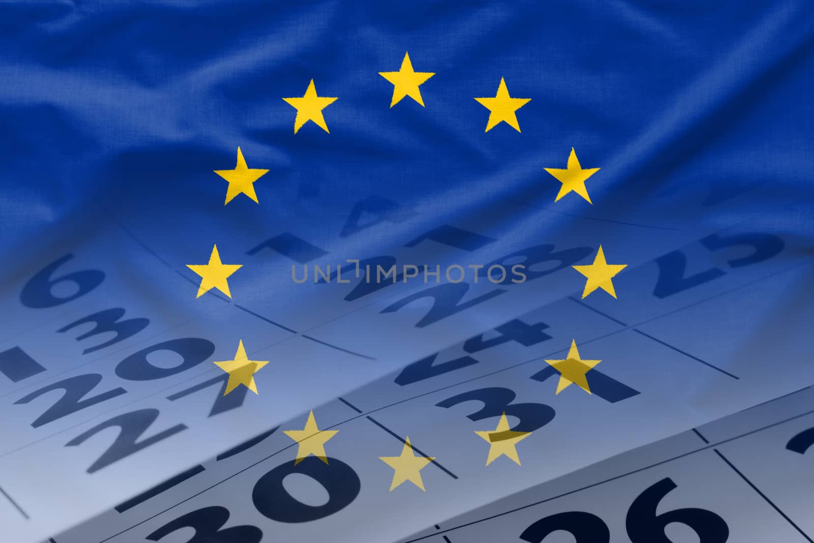 The flag of European Union with calendar of the month in the background. Full frame concept of political event date reminder