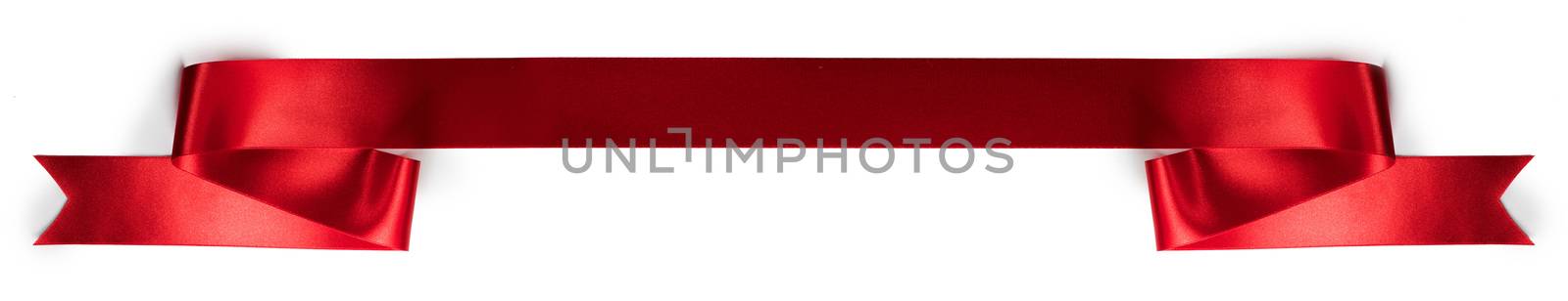 Red satin ribbon banner isolated on white background