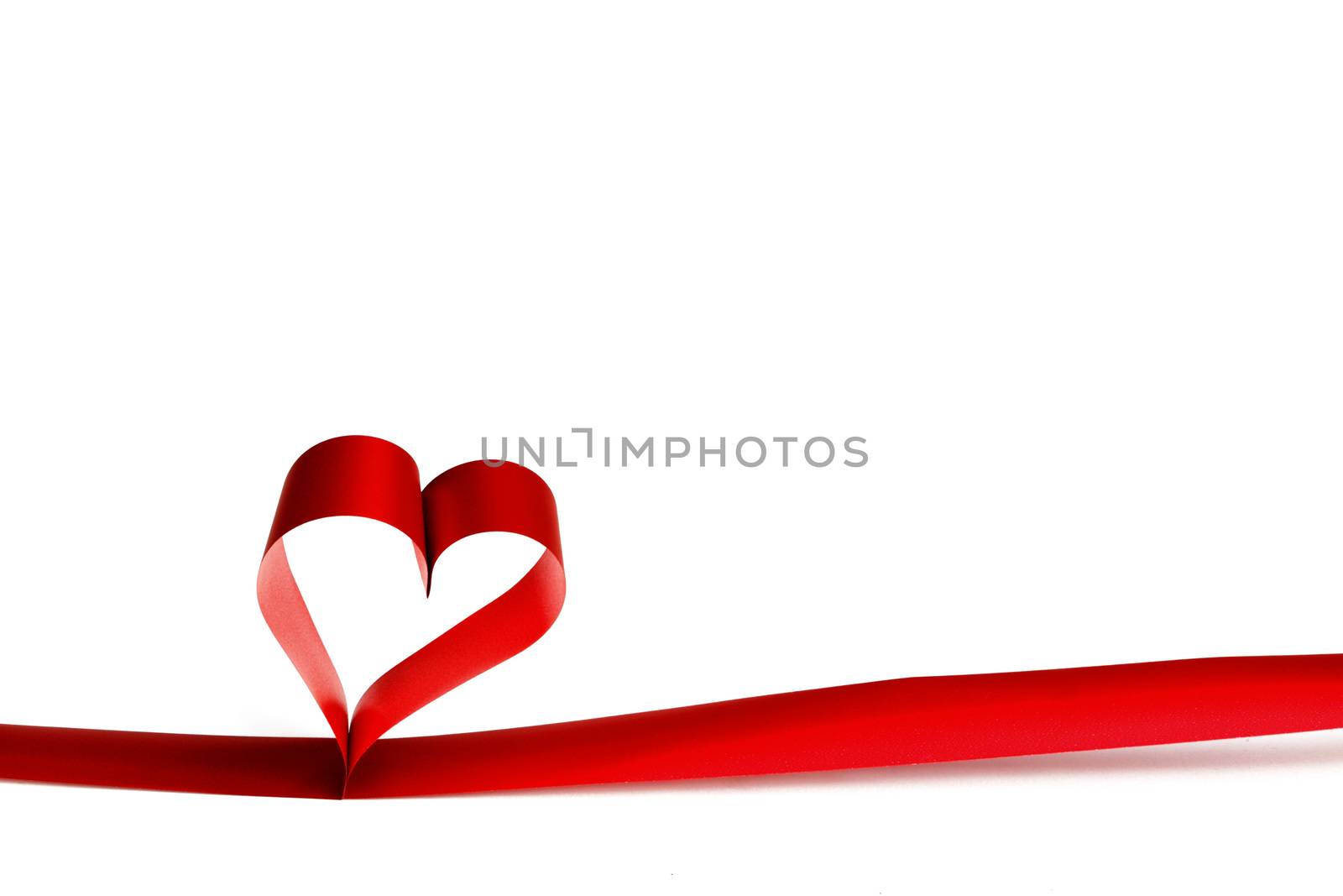 Red heart shaped ribbon isolated on white background Valentines day design