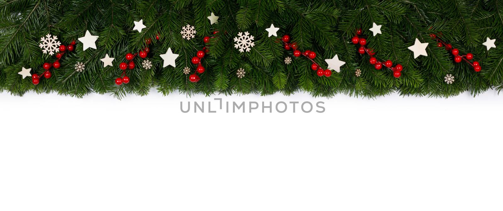 Natural fir Christmas tree border frame with decor isolated on white , copy space for text