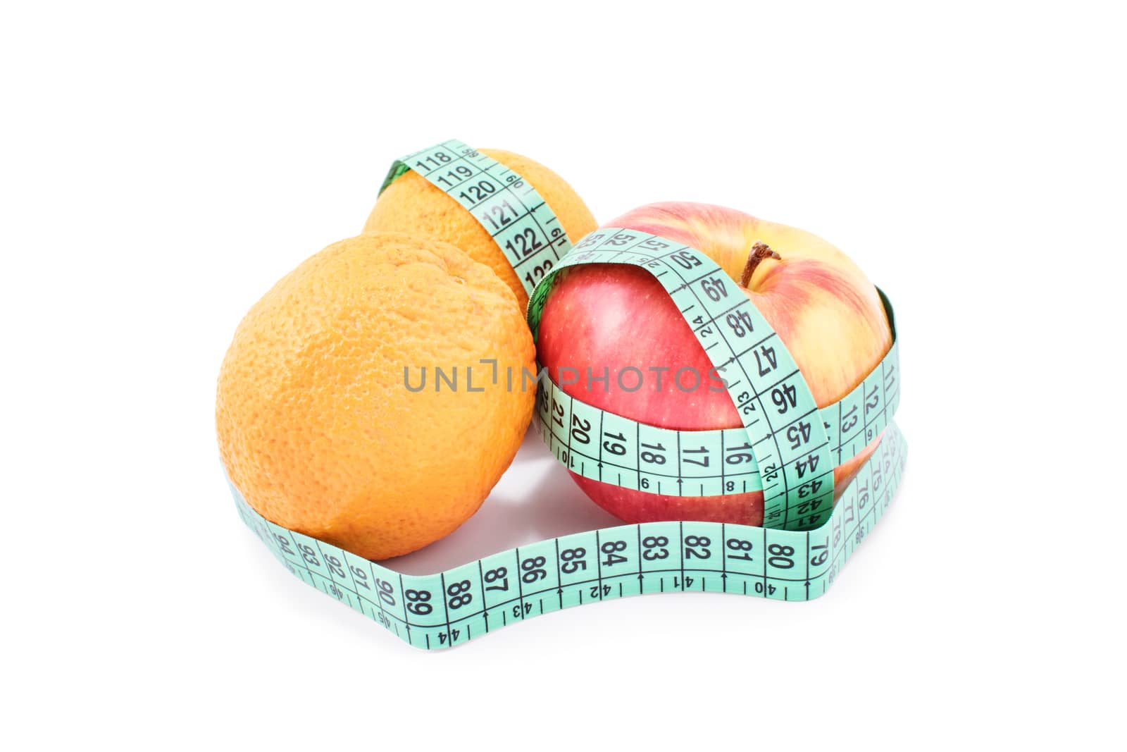 Diet, healthy eating, weight loss concept. Measuring tape wrapped around oranges and an apple, isolated on white background. Symbol of vitamin diet, slim shape and healthy food.