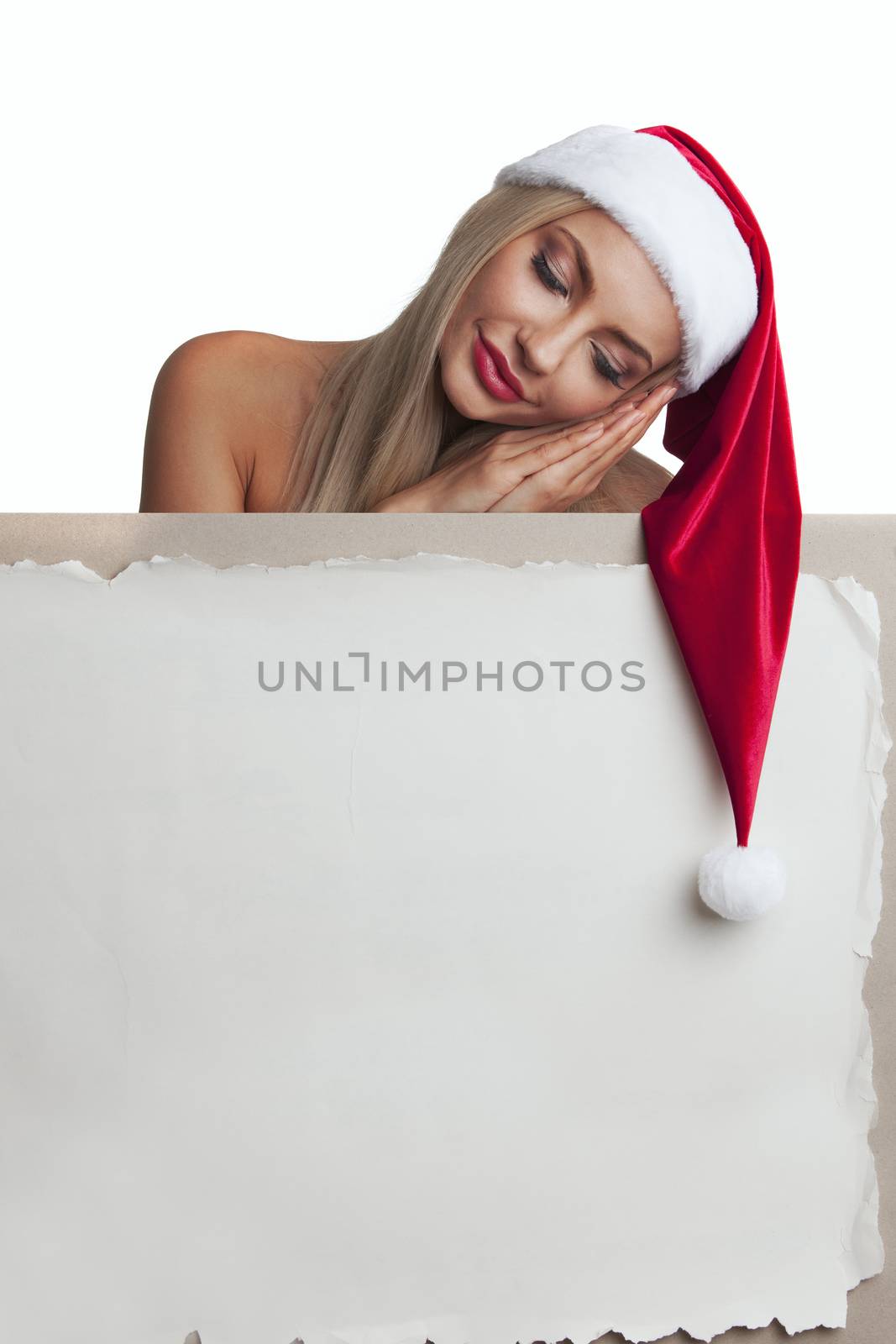 Santa girl holding blank vintage sign billboard. Christmas woman in Santa hat showing paper sign isolated on white background