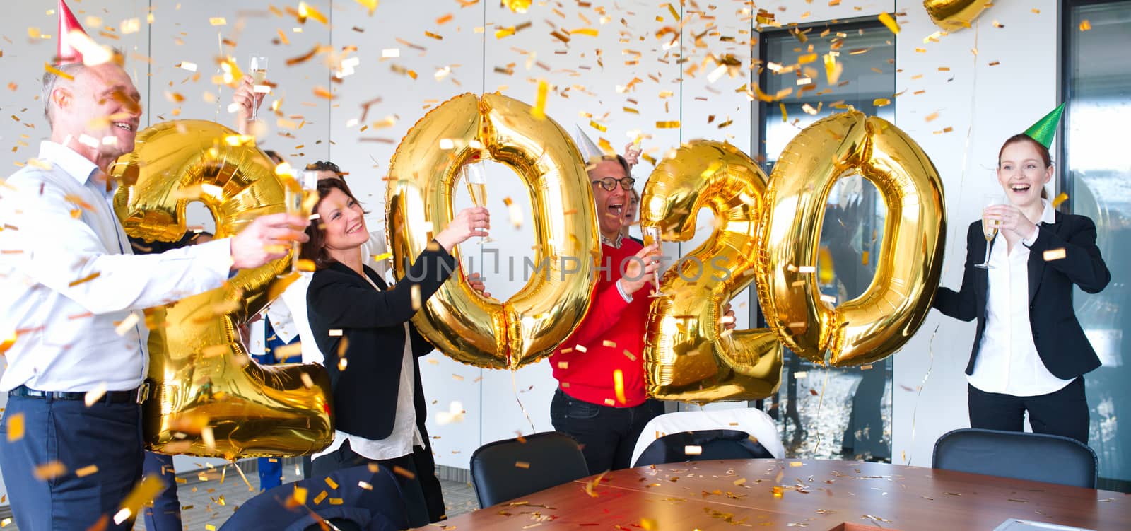Business people are celebrating New Year 2020 by ALotOfPeople