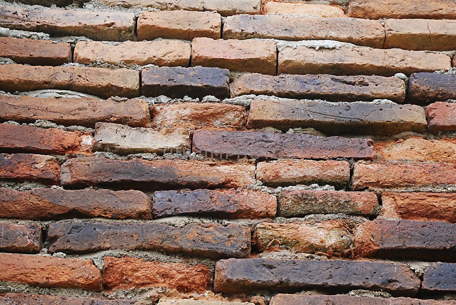 Detailed old red brick wall background texture by wittaya