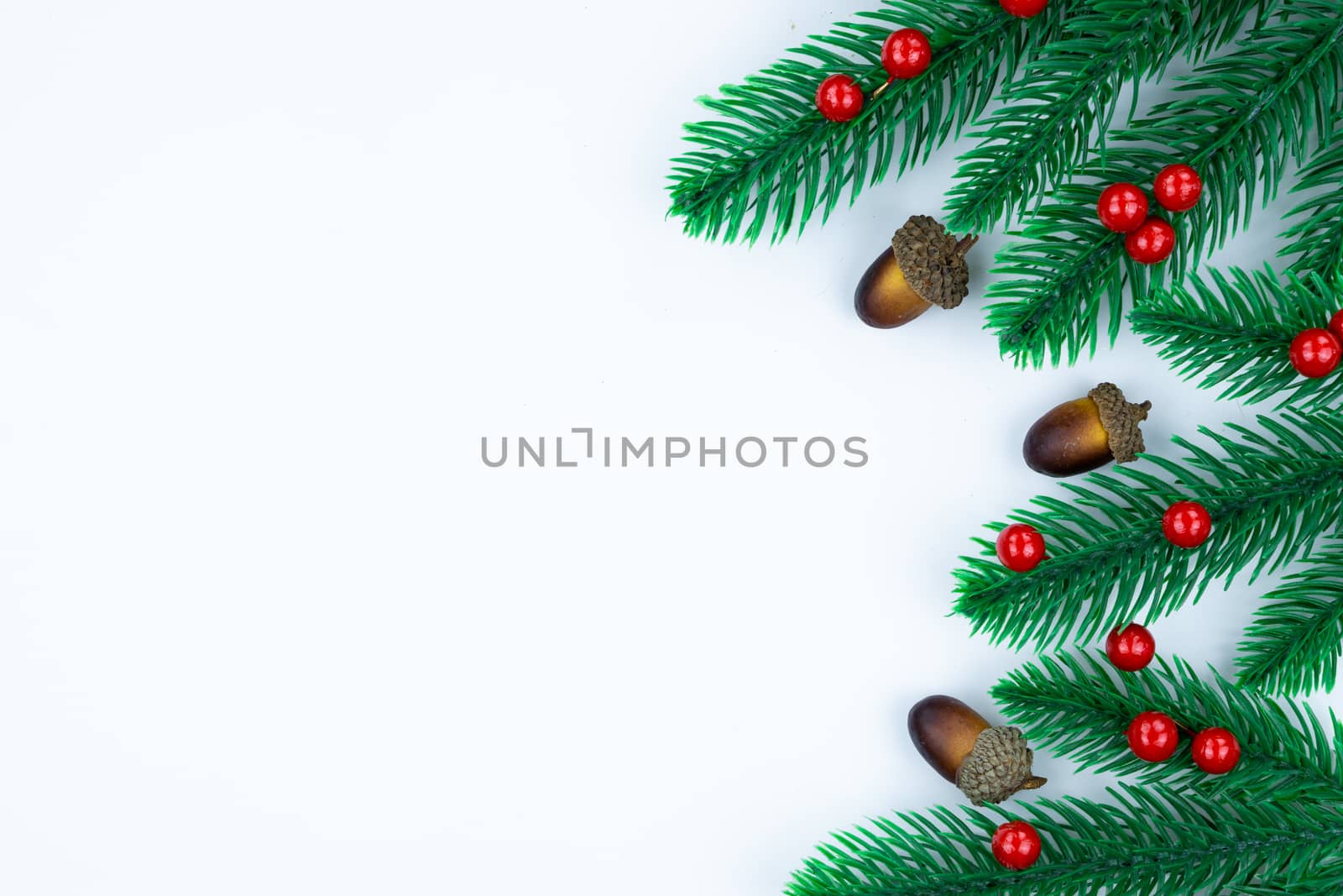 Christmas holidays composition, top view of red and gold Christmas decorations on white background with copy space for text. Flat lay, winter, postcard template, new year concept.