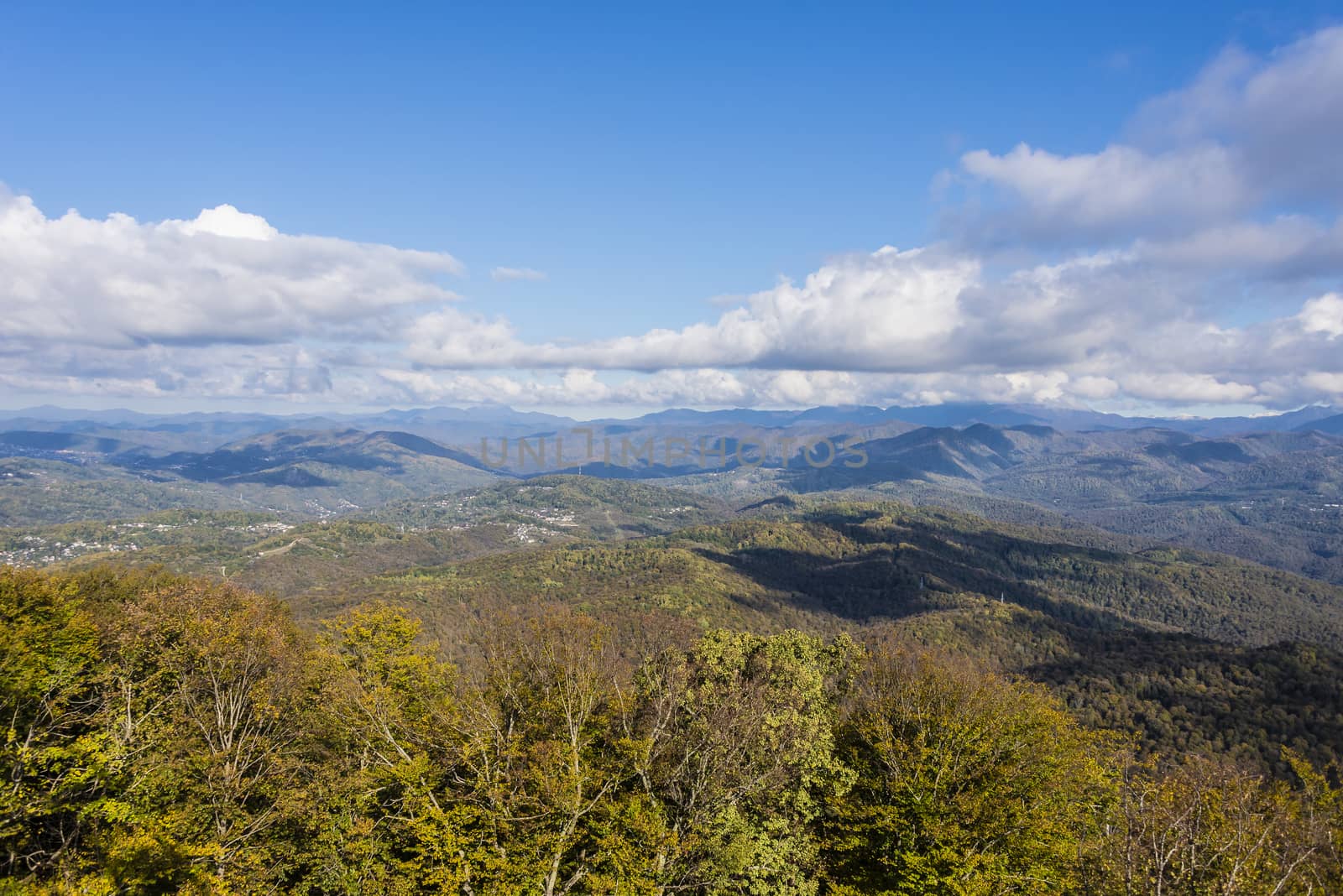 View of the Caucasus mountains from the observation deck from mount Akhun, near the city of Sochi, Russia. 2 November 2019.