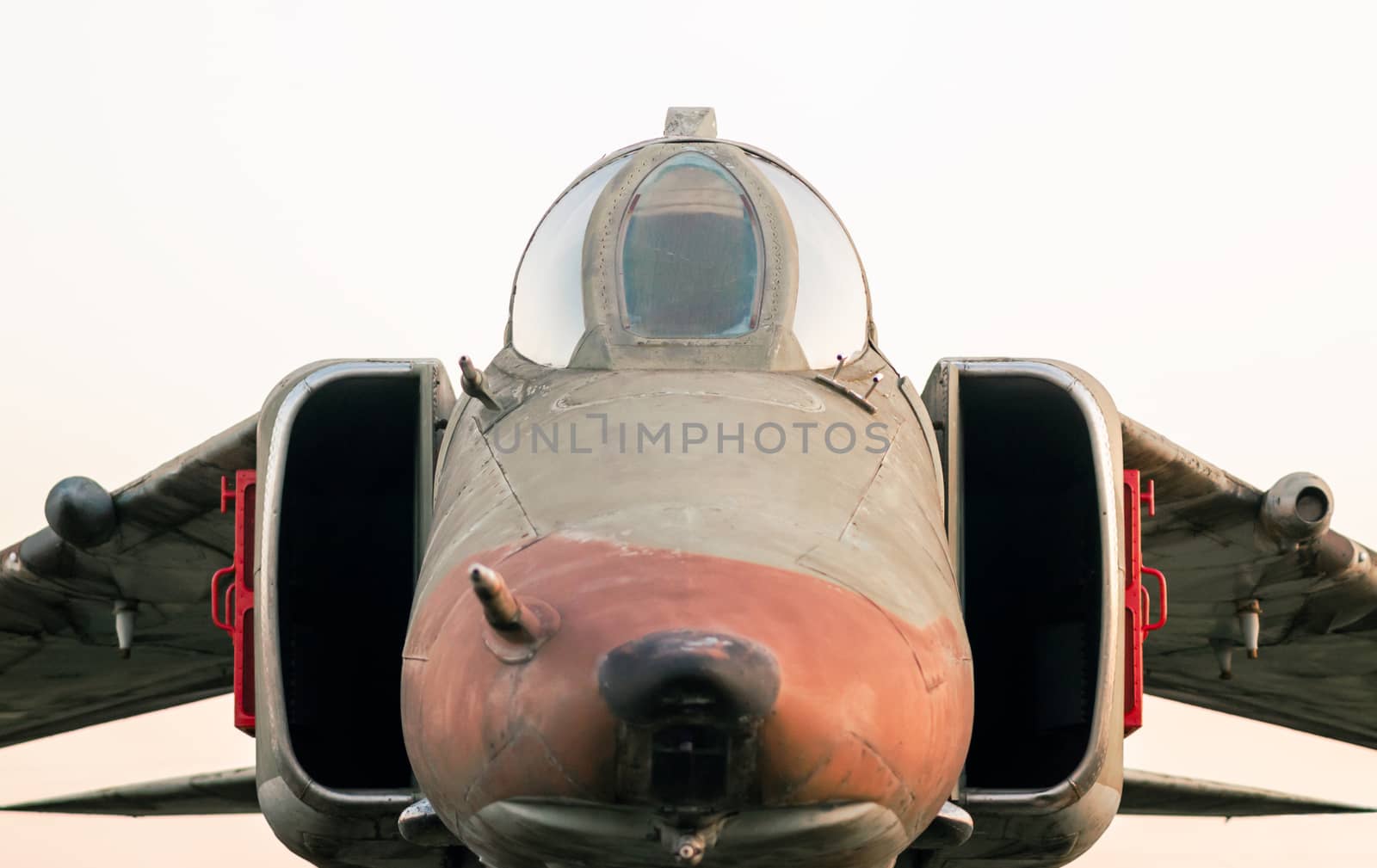 old military army fighter aircraft isolated on white background close up