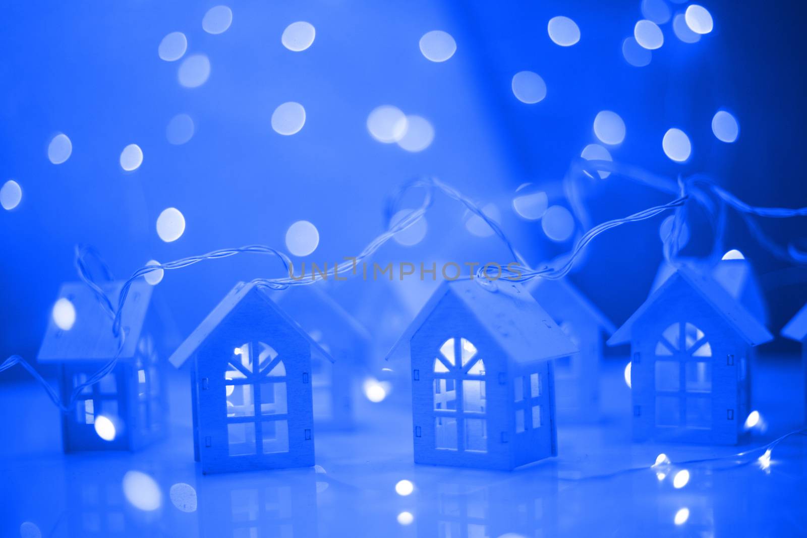 Glowing houses Christmas card by destillat