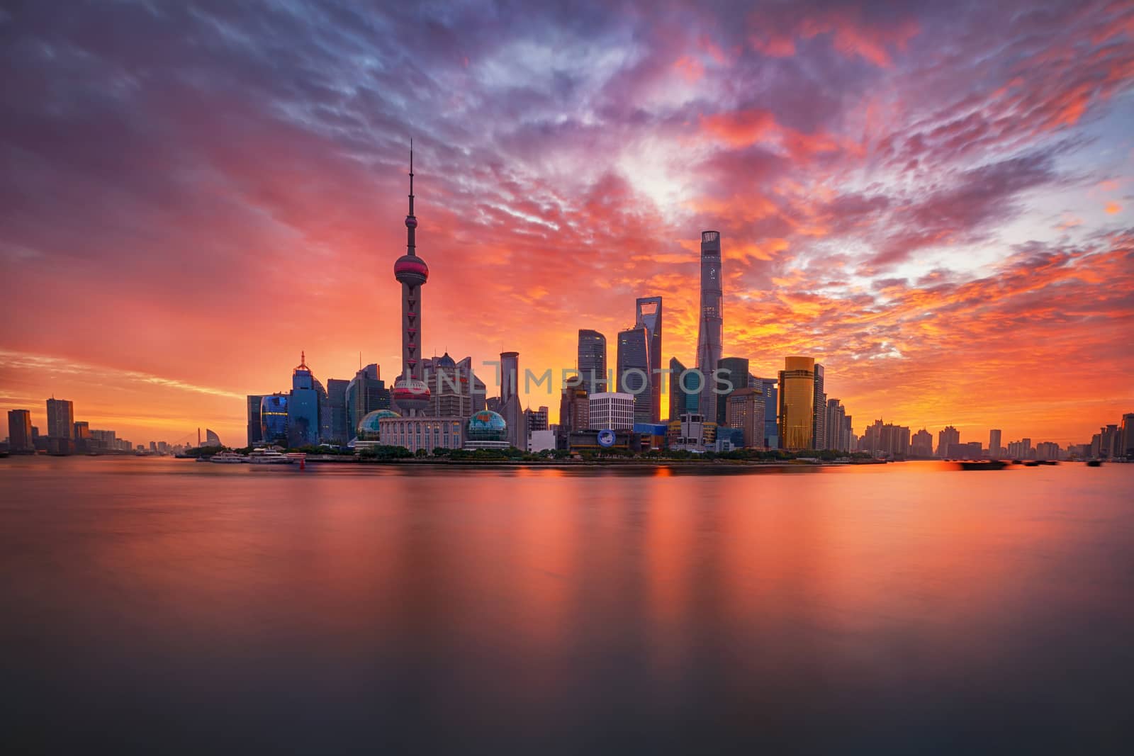 colorful sunrise over Lujiazui skyline and Huangpu river, Shanghai, China