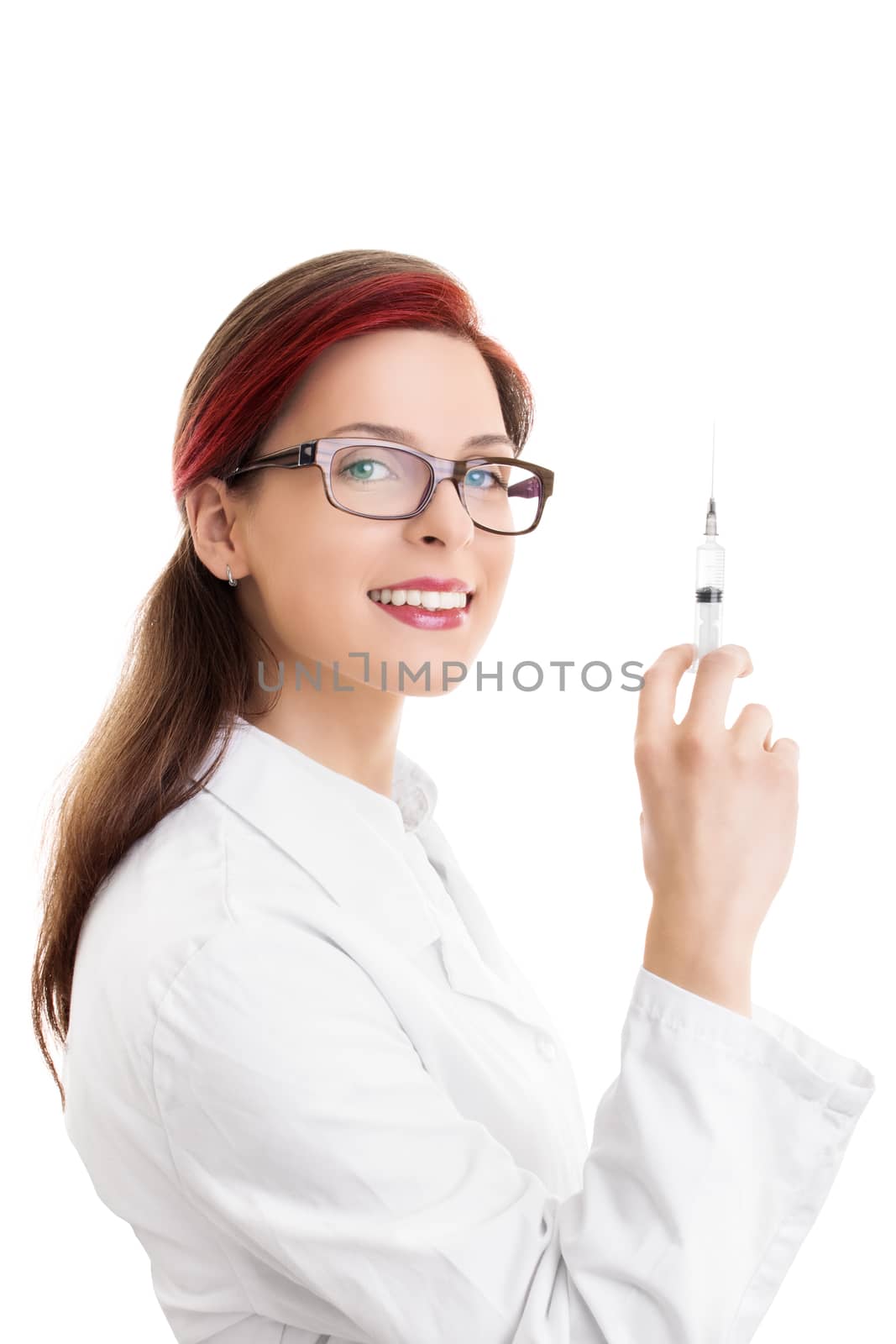 Vaccine, immunization, vaccination concept. Close up shot of a beautiful smiling young female doctor with glasses holding a syringe with needle, isolated on white background. Healthcare concept.