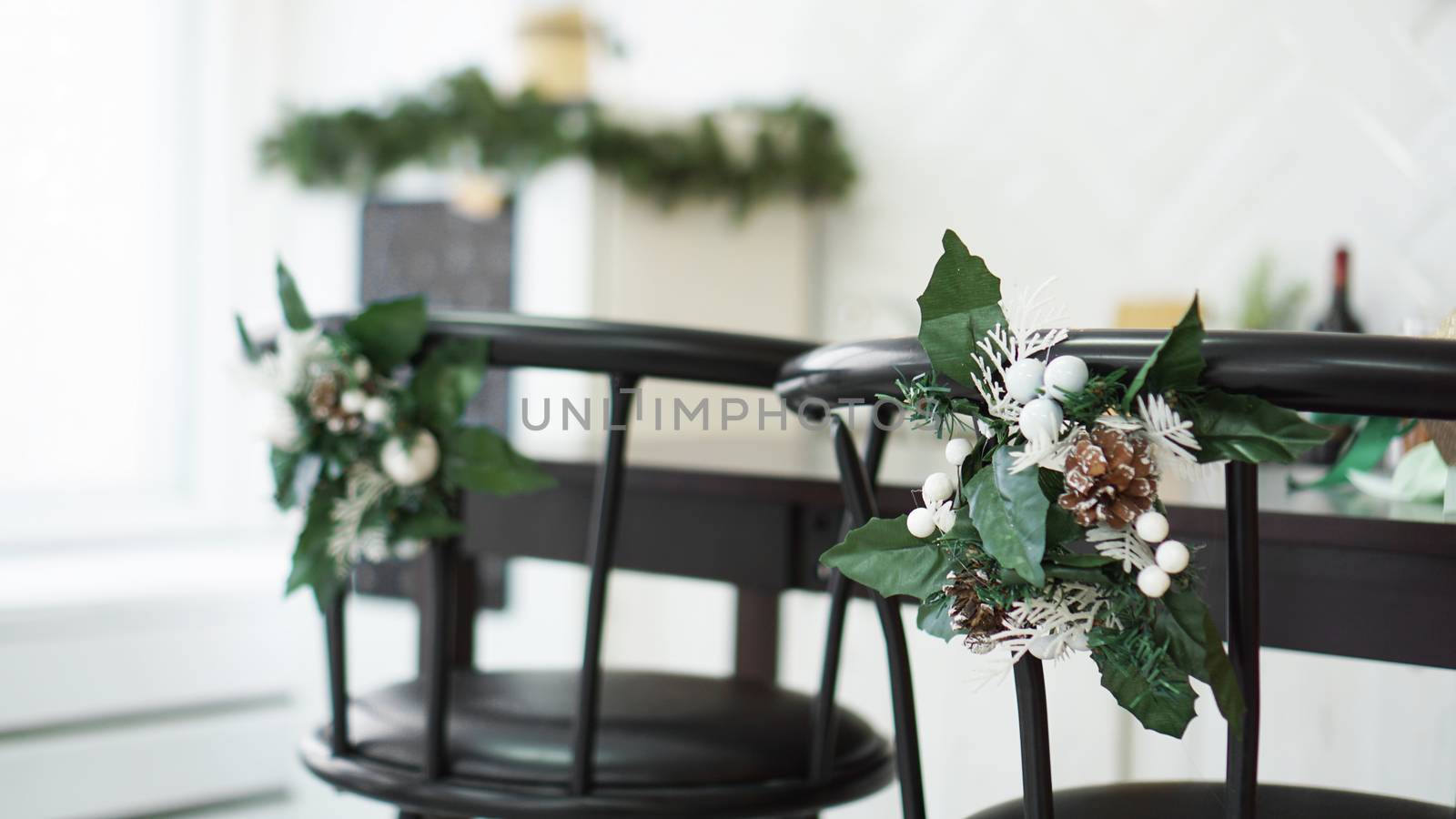 Interior light kitchen with christmas decor and bar chair