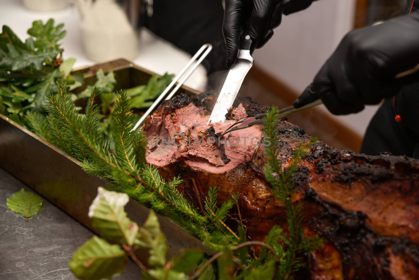 Serving of traditional Polish roasted meat of wild boar on wedding event