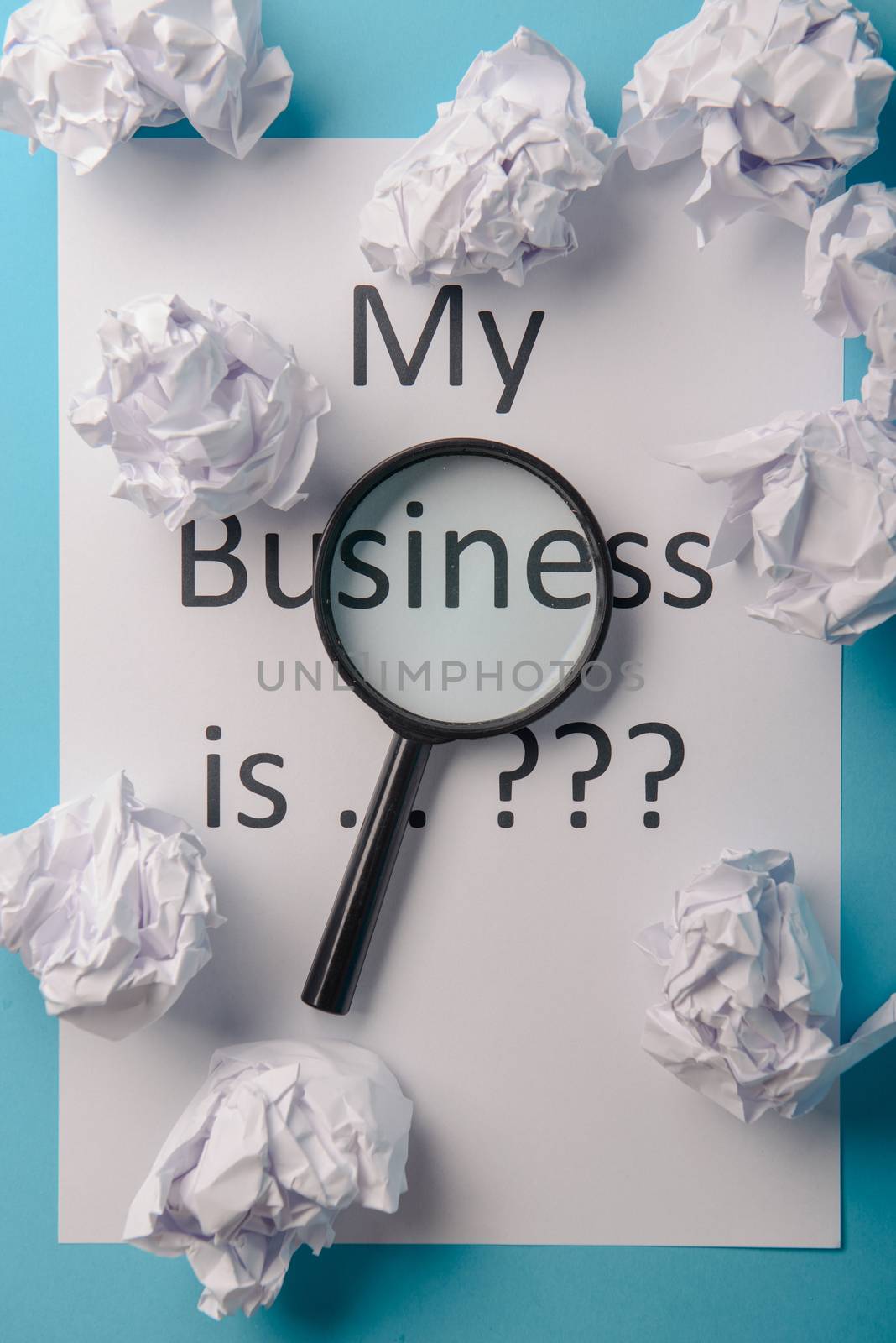 My business is word concept. Business word with business document paper on blue background. For business concept ideas background.