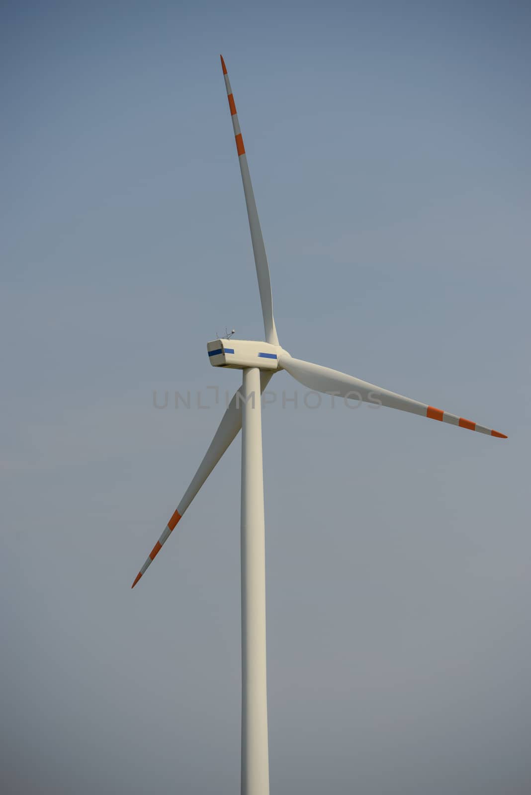 wind trubine at sunny day with blue sky