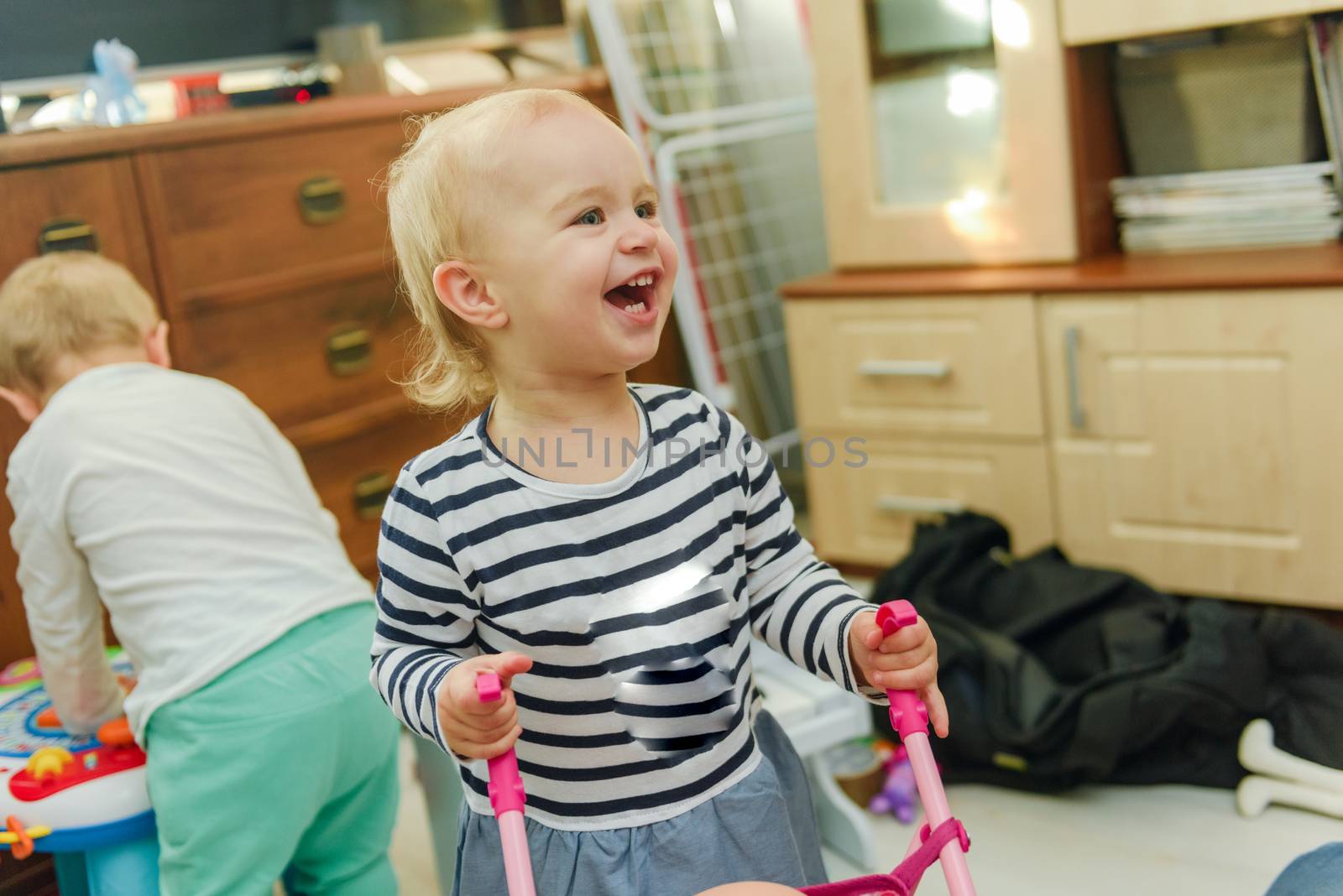 Portrait of adorable baby girl. Childhood. Authentic image