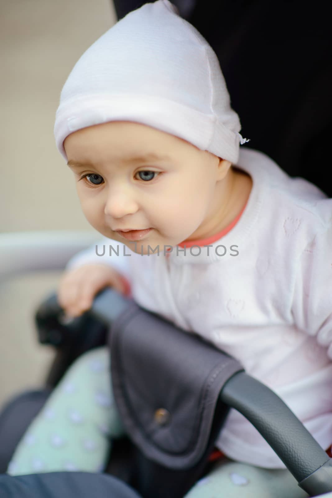 Adorable girl having fun on beautiful autumn day. authentic childhood image