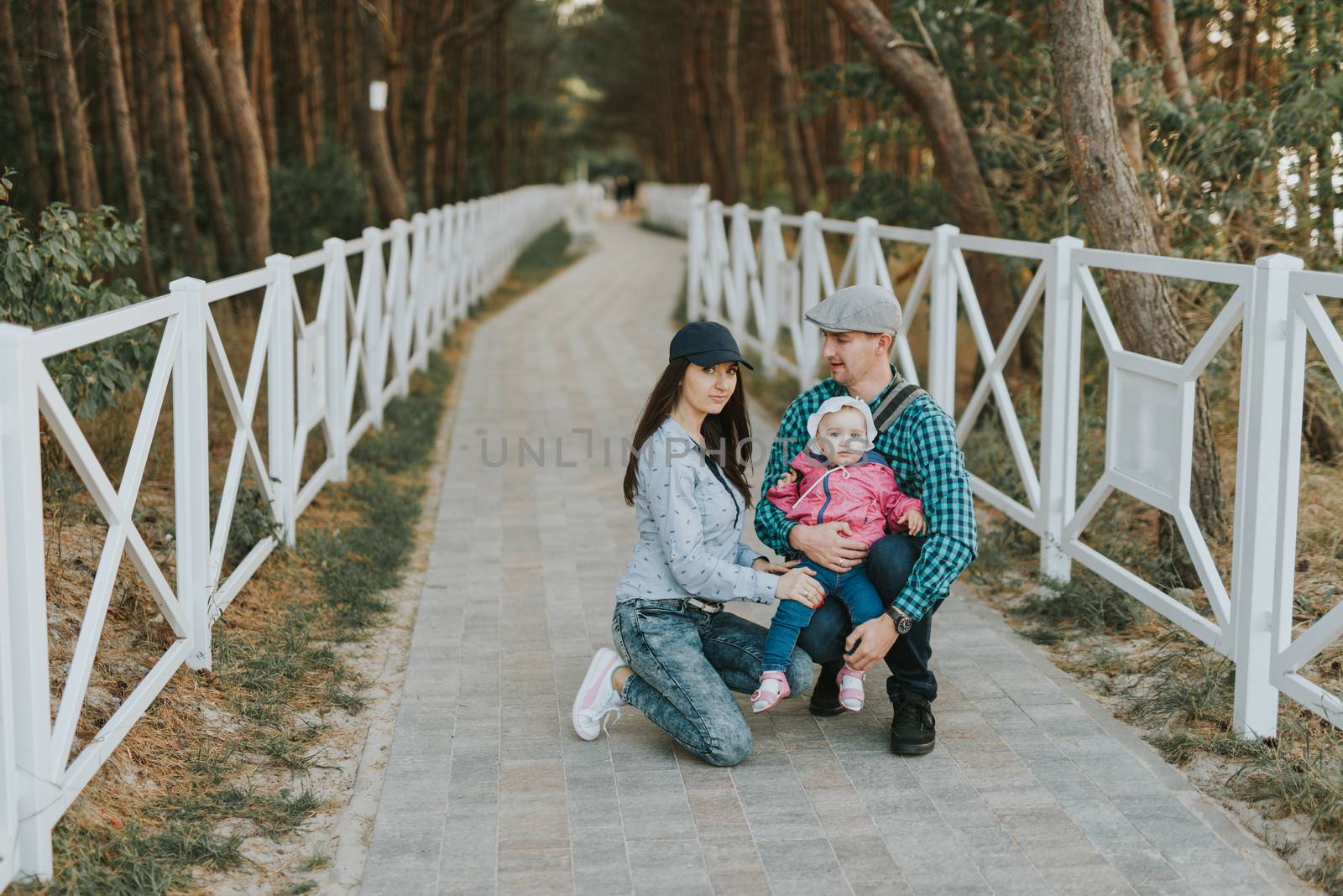 Happy loving family. Father and his daughter child girl playing  by Brejeq