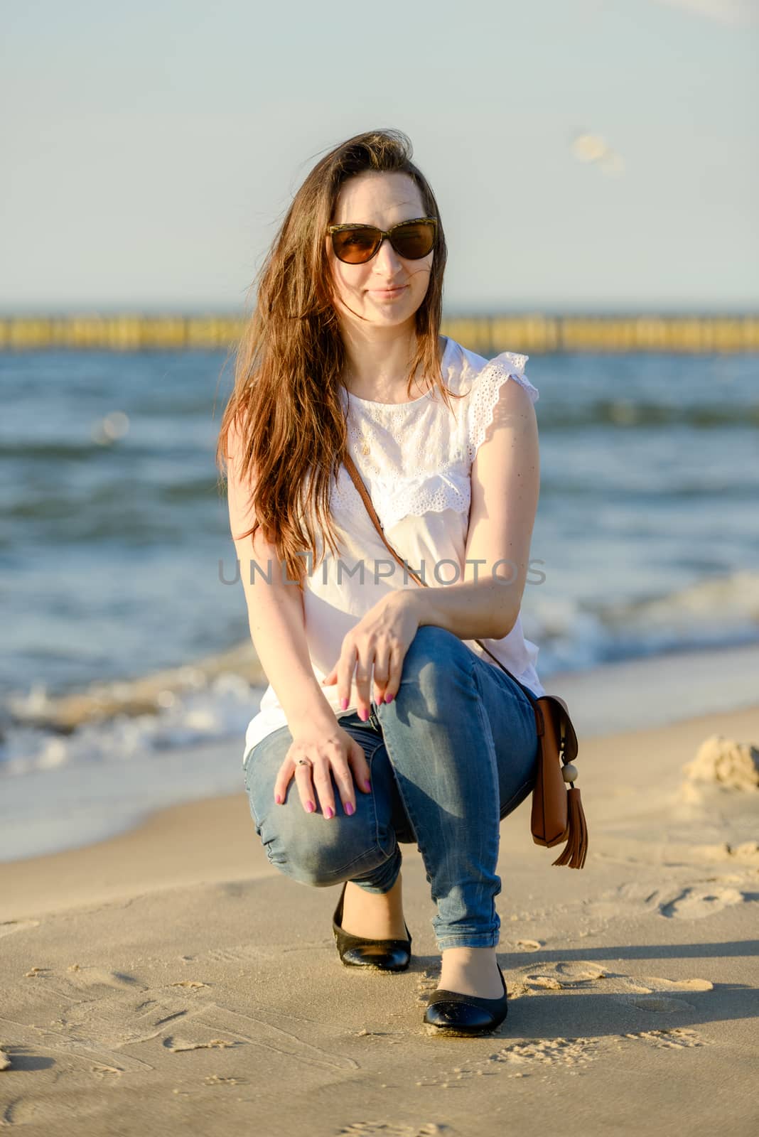 Portrait of smiling young woman enjoying the time.