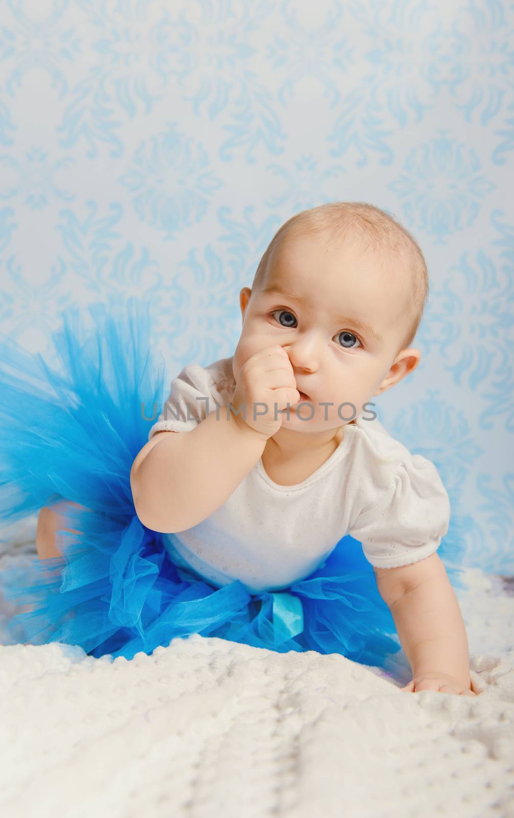 Portrait of adorable baby girl. Childhood. Authentic image