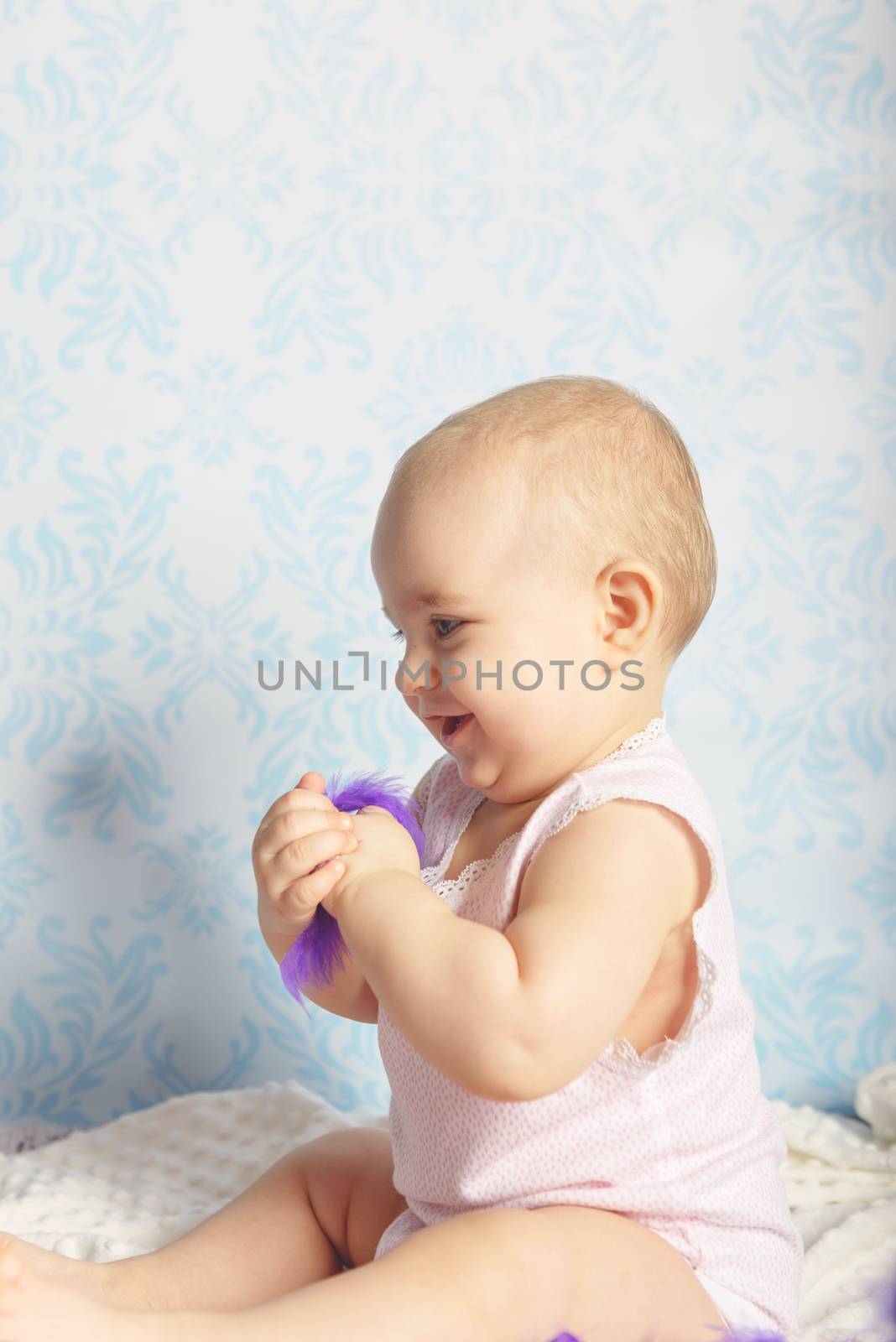 Portrait of adorable baby girl. Childhood. Authentic image
