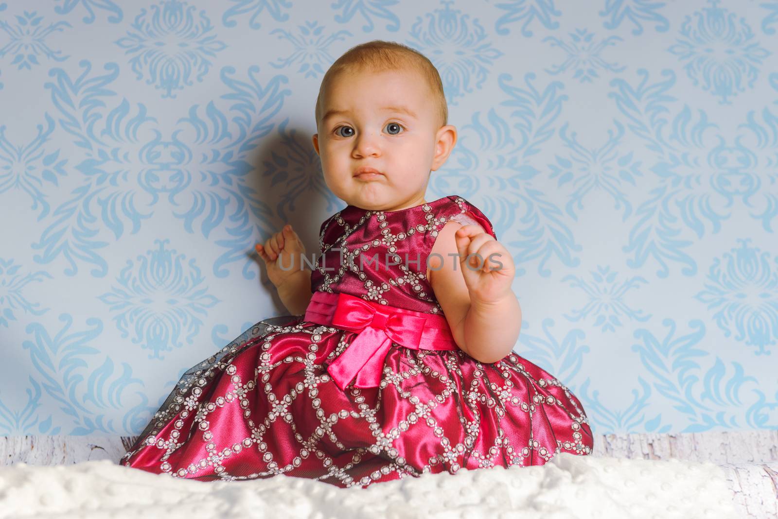 Portrait of adorable baby girl. Childhood. Authentic image