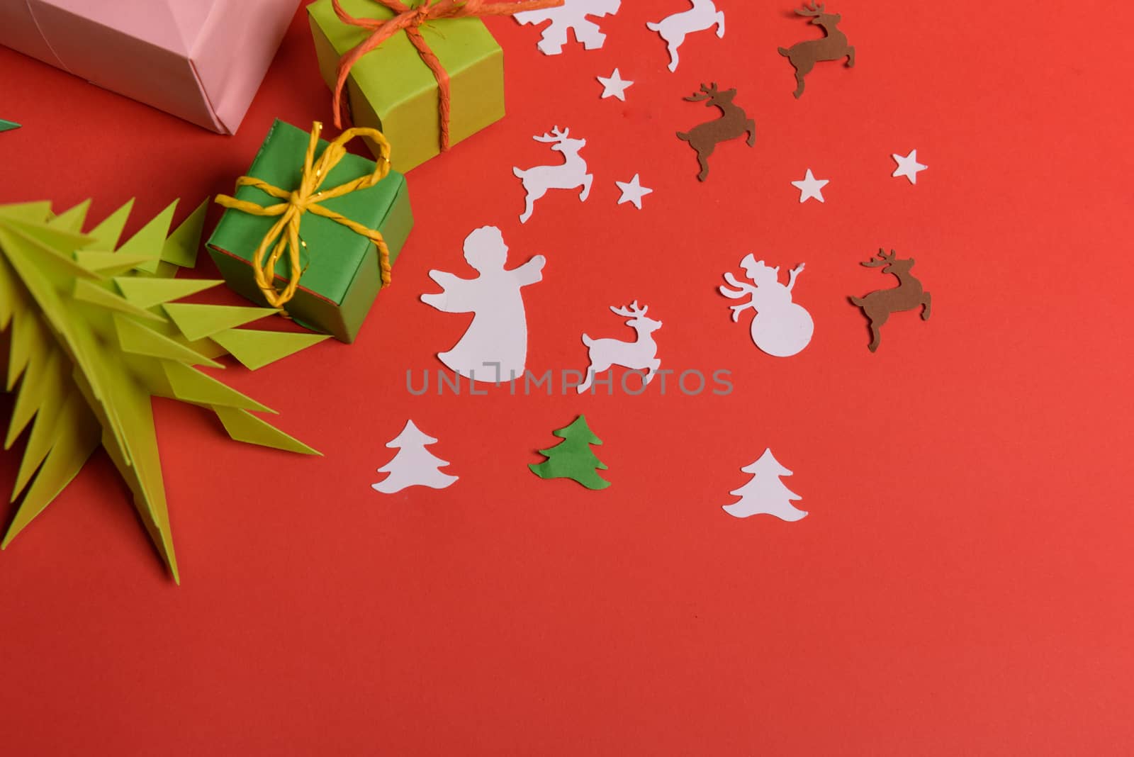 Christmas or New Year background, plain composition made of Xmas decorations and fir branches, flat lay, blank space for a greeting text.