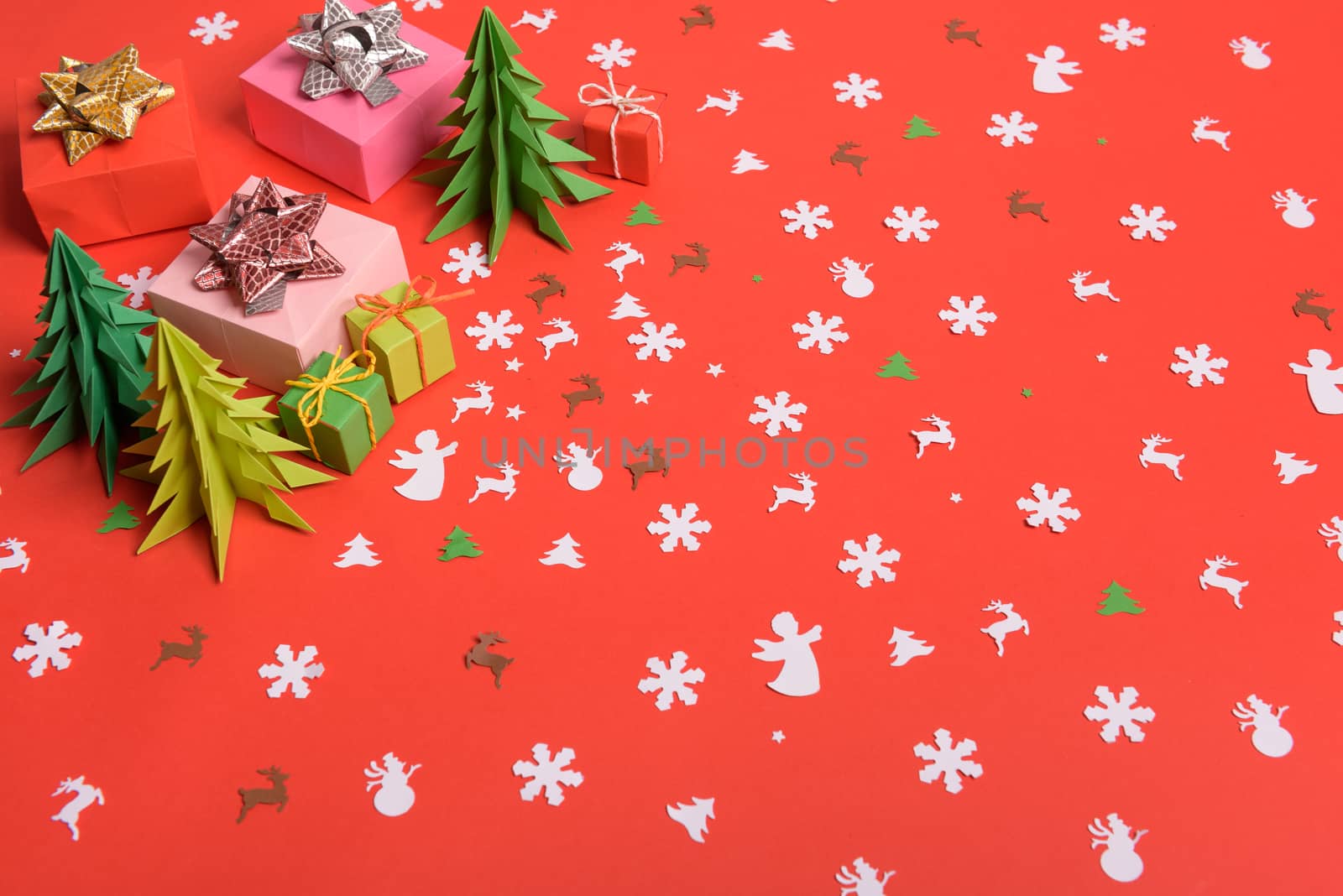 Christmas or New Year background, plain composition made of Xmas decorations and fir branches, flat lay, blank space for a greeting text.
