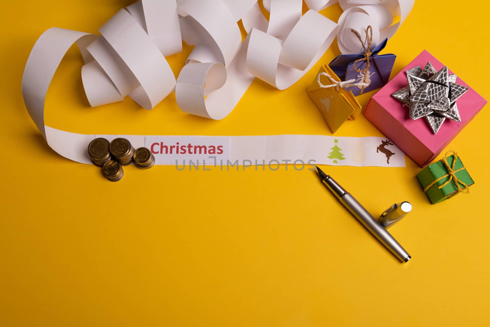 Long twisted expanded letter for Santa Claus. Copy space. yellow background
