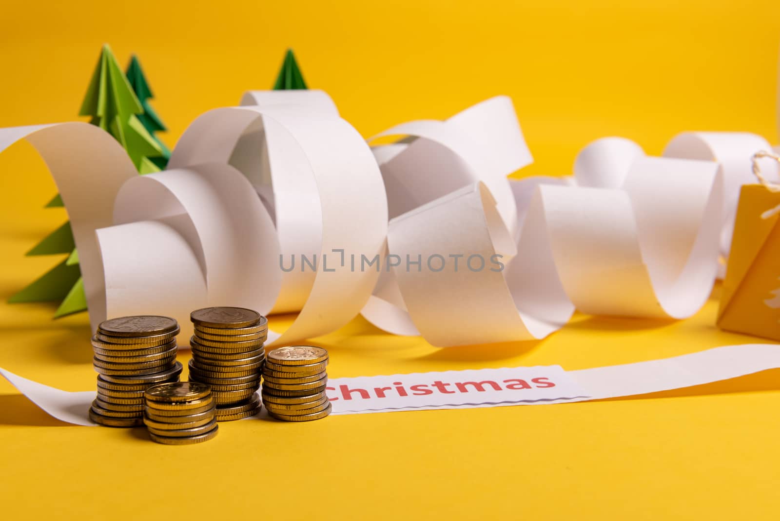 Long twisted expanded letter for Santa Claus. Copy space. yellow background