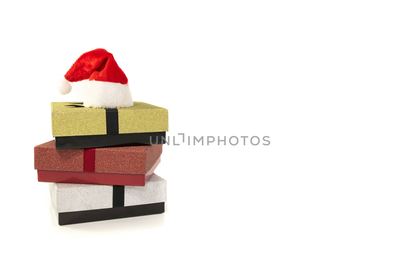 three gift boxes in red silver and gold by compuinfoto