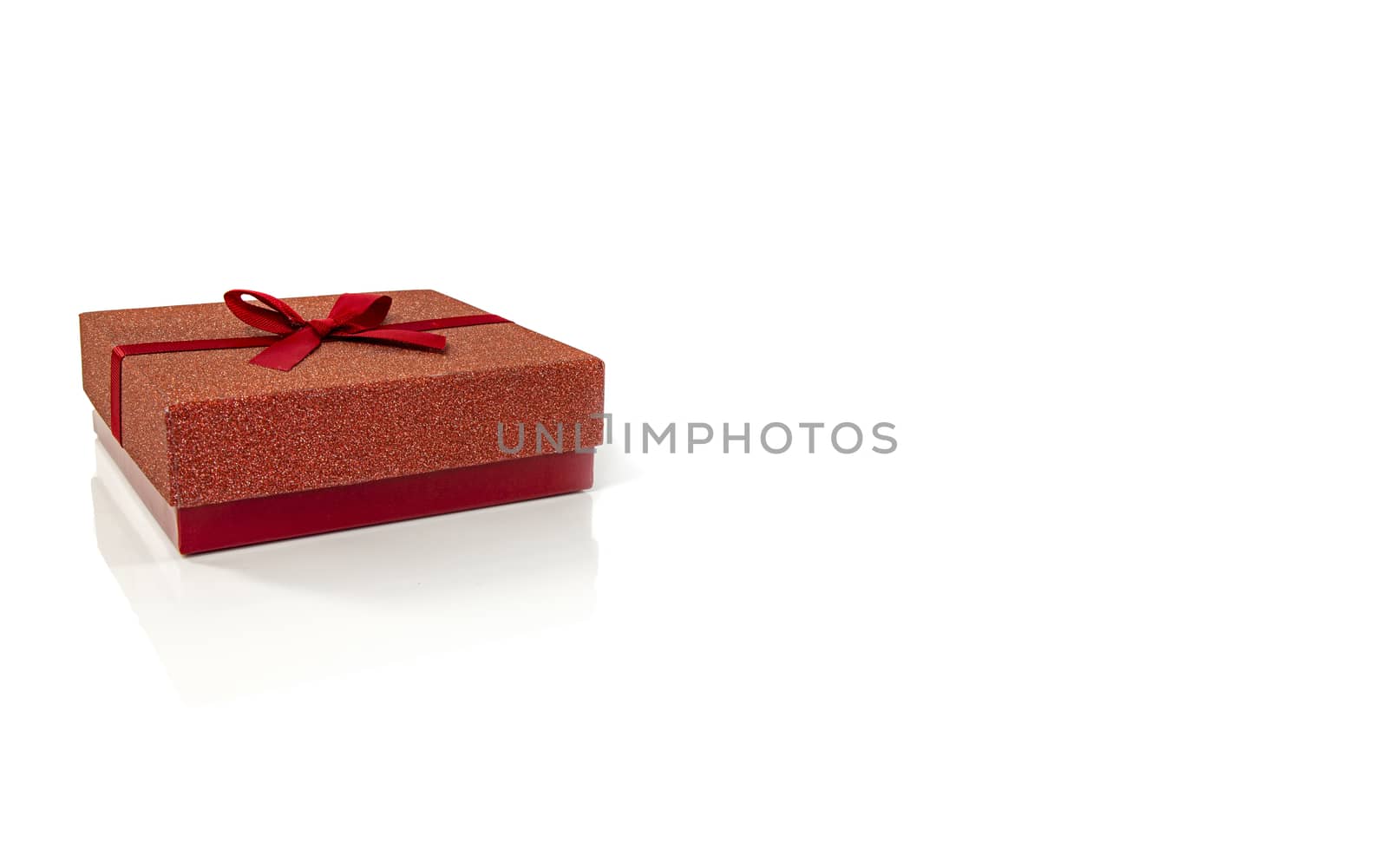 red gift box isolated on white by compuinfoto
