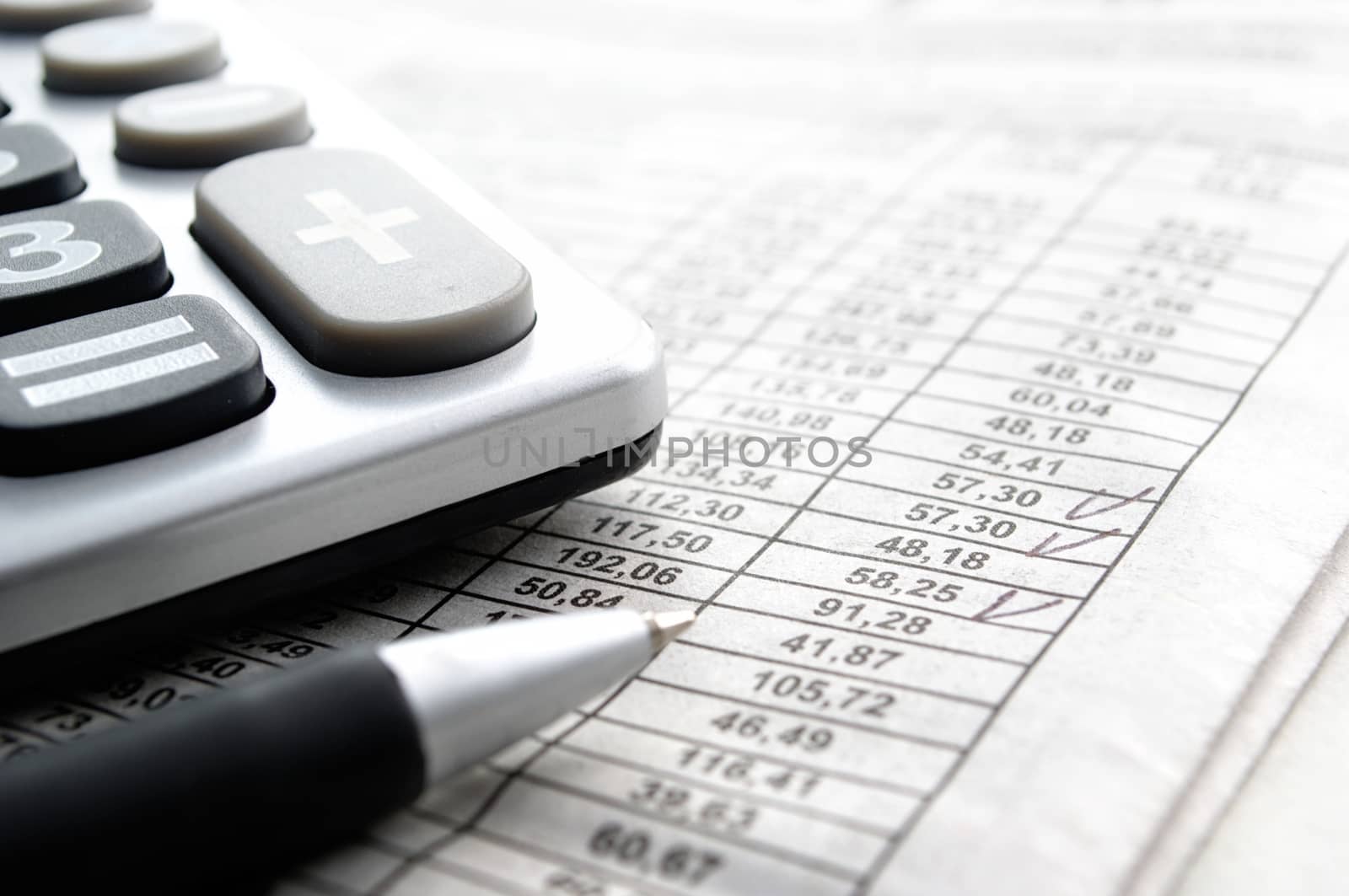 calculator and stationery items on the table