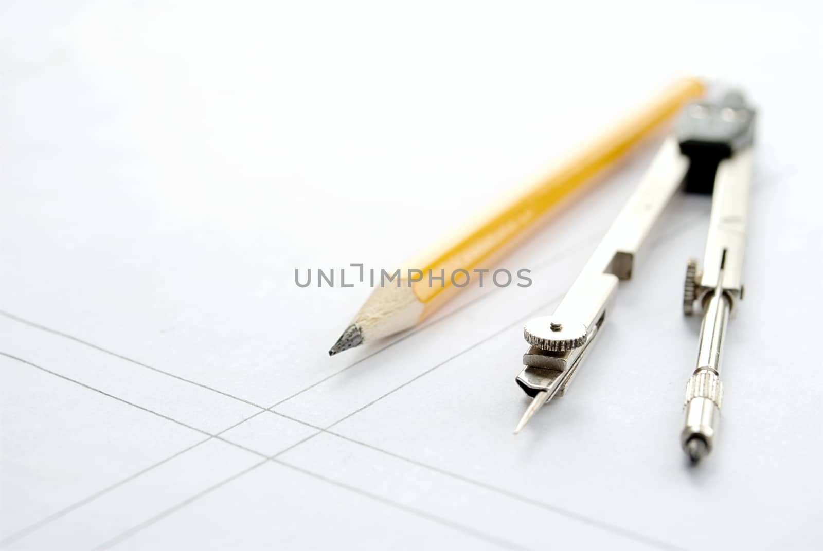 compasses for drawing on the table