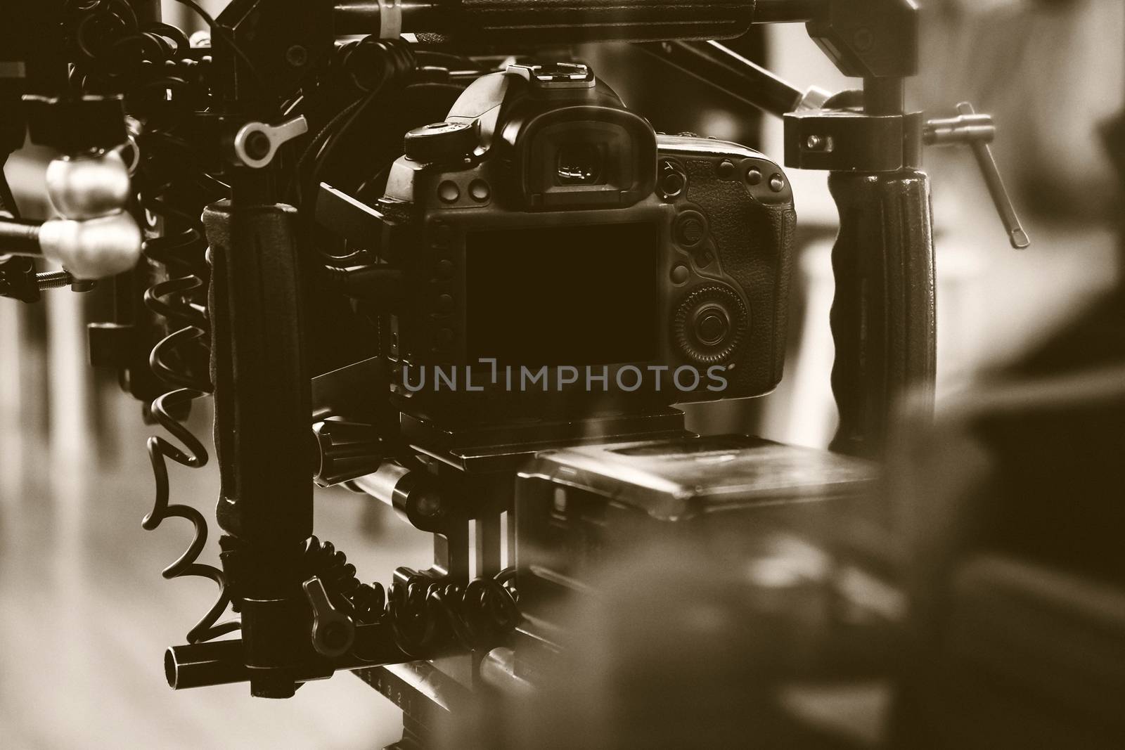 Film industry. Filming with professional camera background