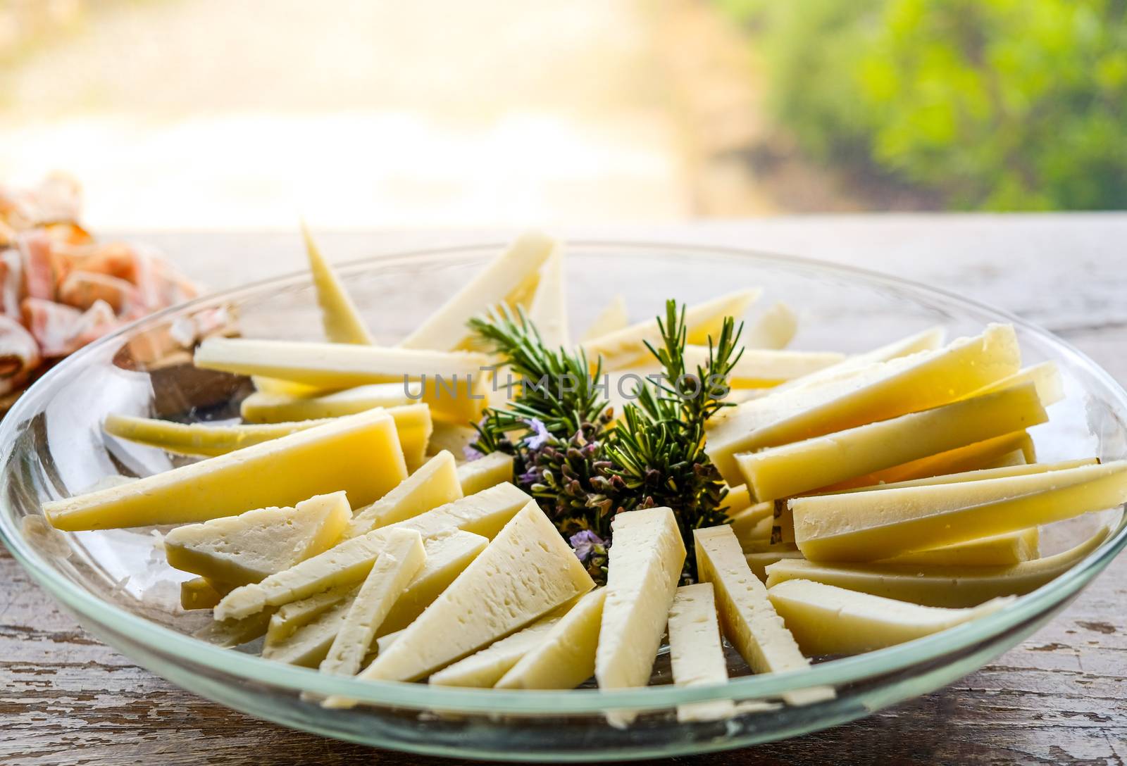 cheese wedges on a plate slices of pecorino .