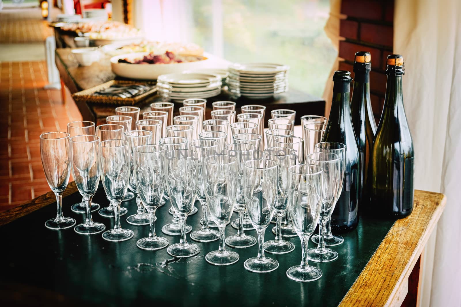 toasting many glasses for anniversaries empty goblets chalices before the toast at the restaurant to celebrate anniversary .