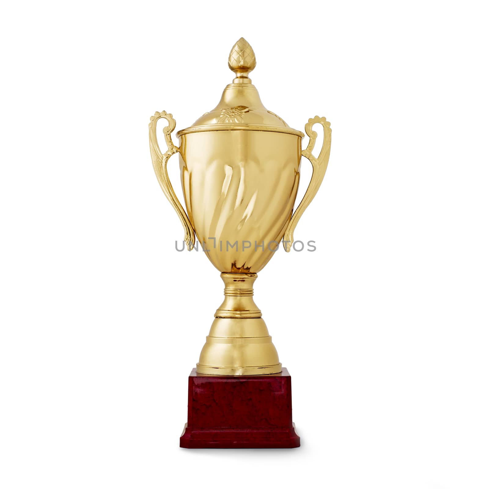 Close-up of a golden shiny cup, reward for the winner of a competition, on white background