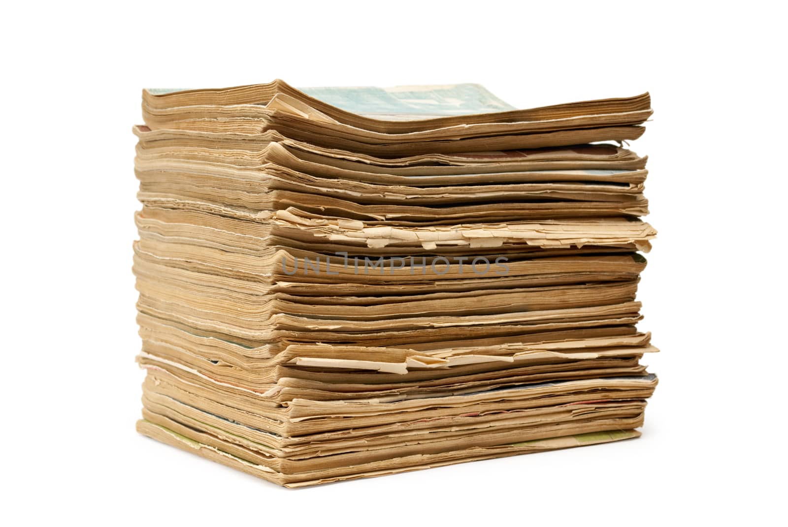 a stack of old magazines on white background