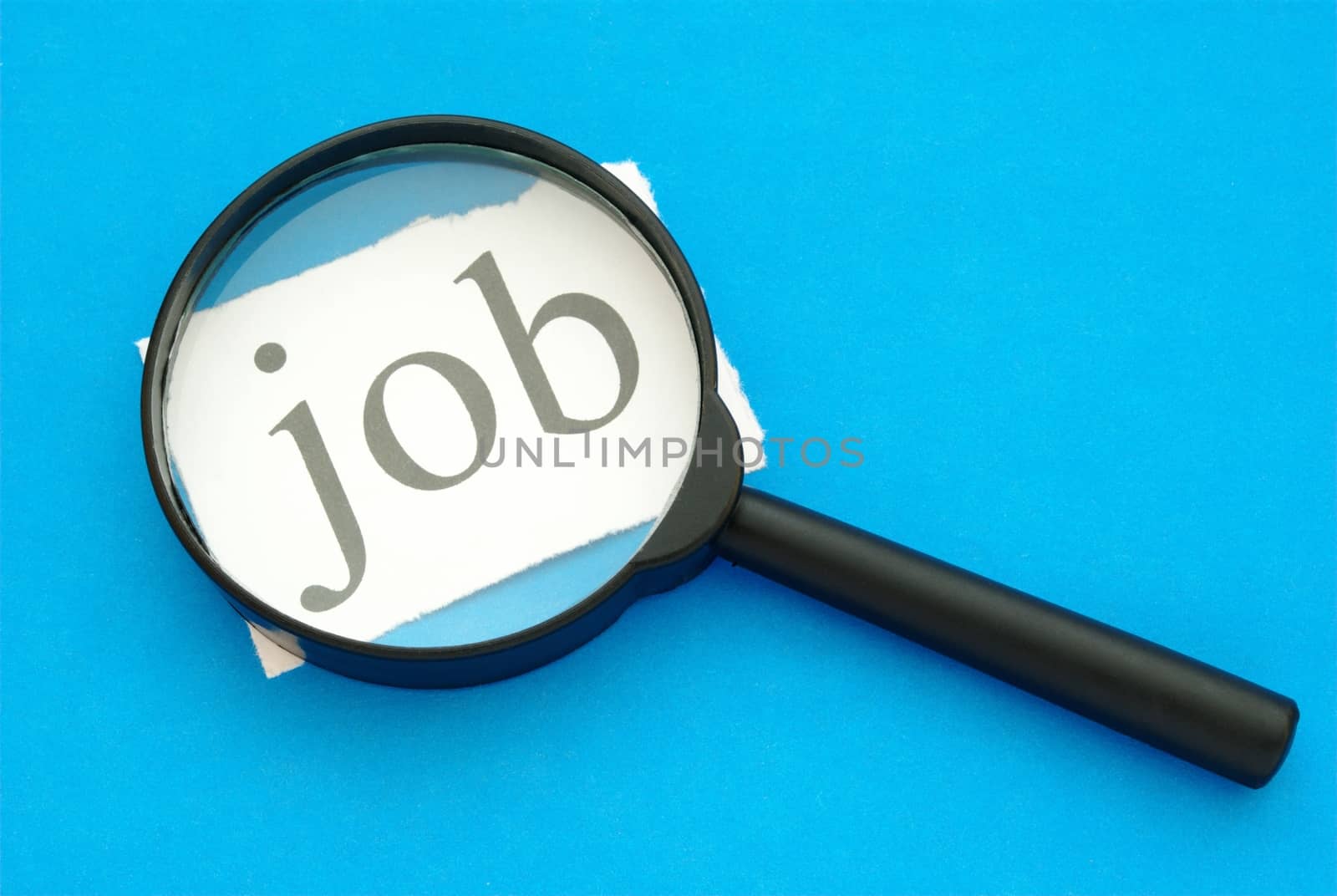 magnifying glass and a piece of paper with the words "job" on a blue background